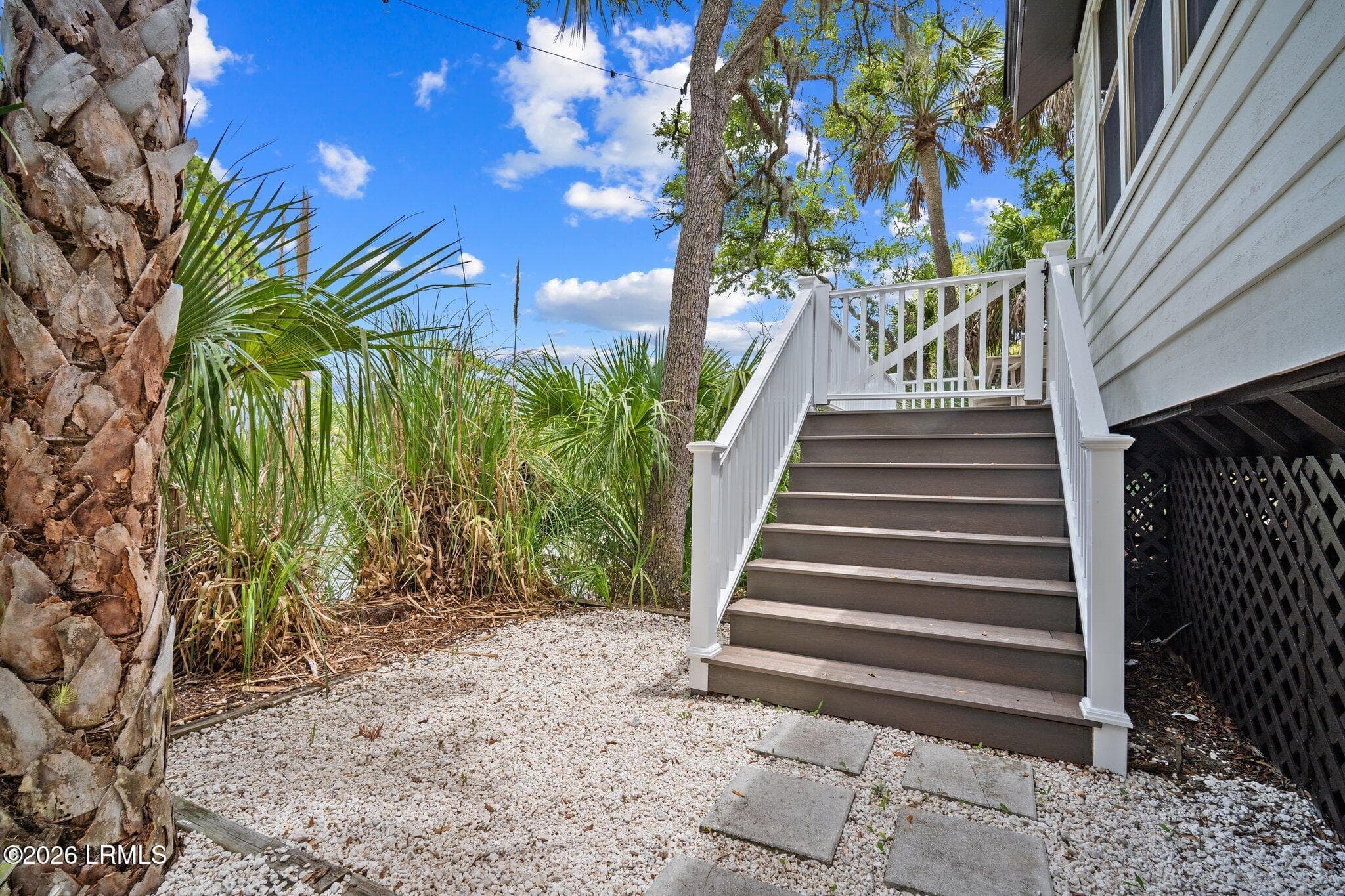 Stairs to the backyard - 239 Deerfield Court, Fripp Island, SC 29920