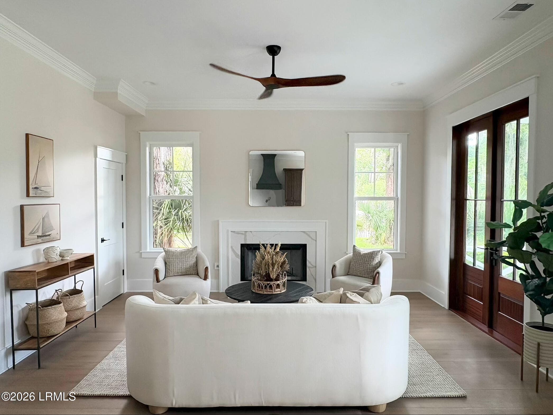 Fireplace and seating - current staging - 902 Harrington Street, Beaufort, SC 29902