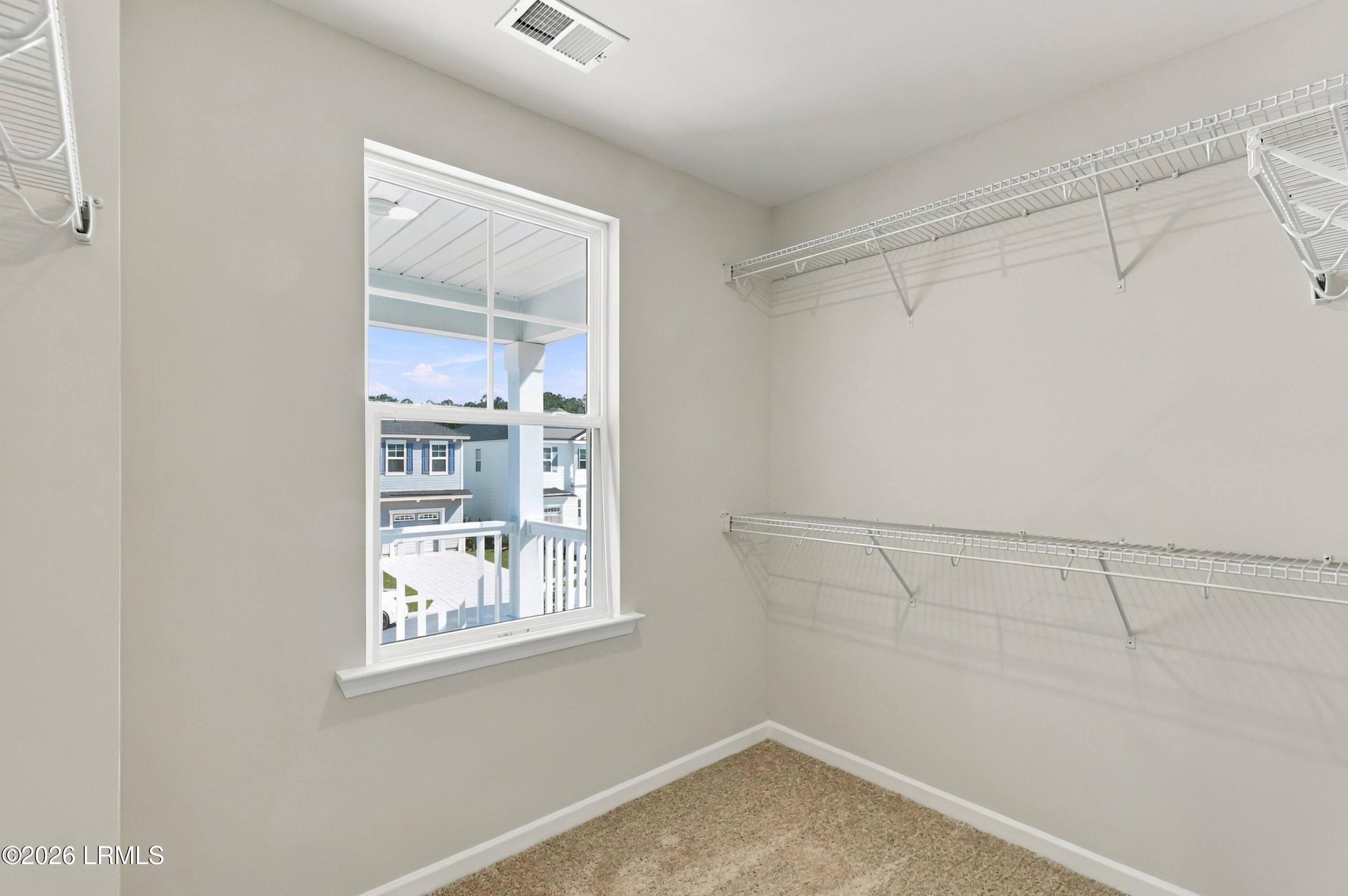 Primary walk-in closet - 397 Conifer Street, Hardeeville, SC 29927