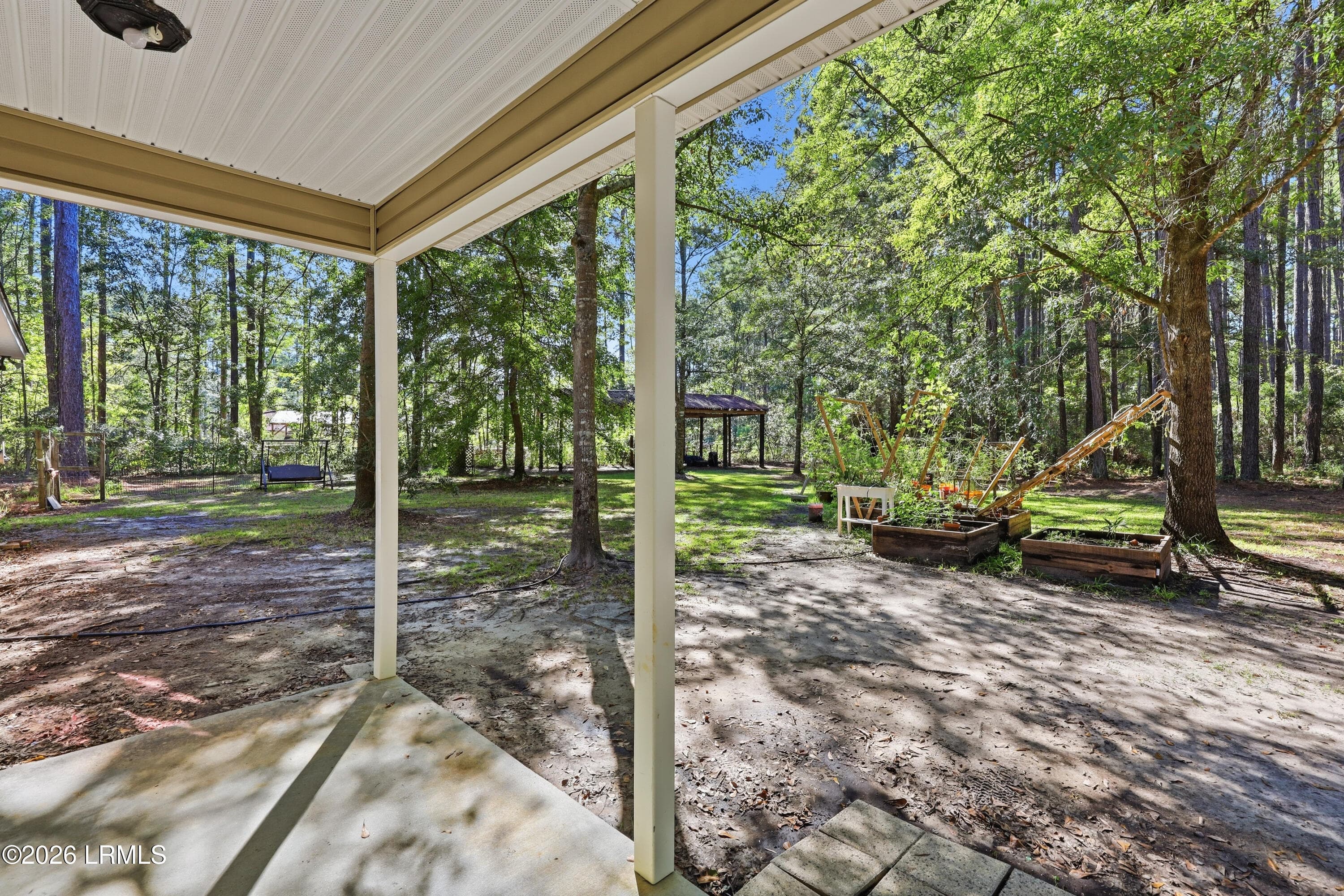 garden and patio area - 2248 Honey Hill Circle, Ridgeland, SC 29936