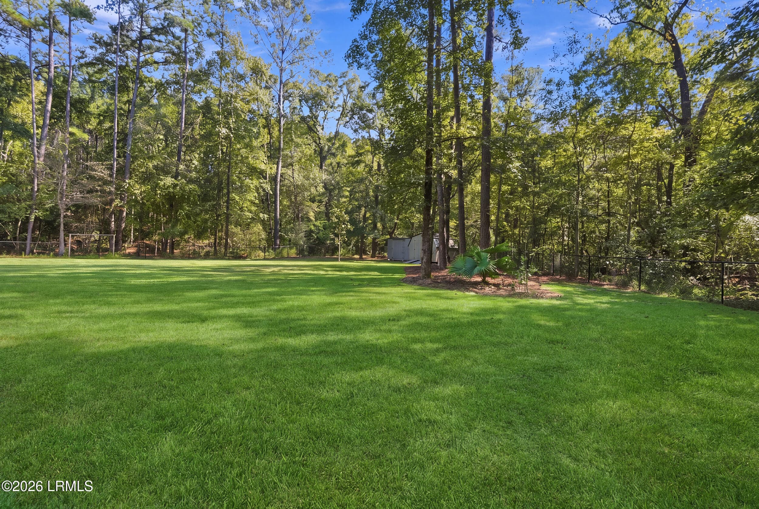 fenced yard - 309 Honey Hill Circle, Ridgeland, SC 29936