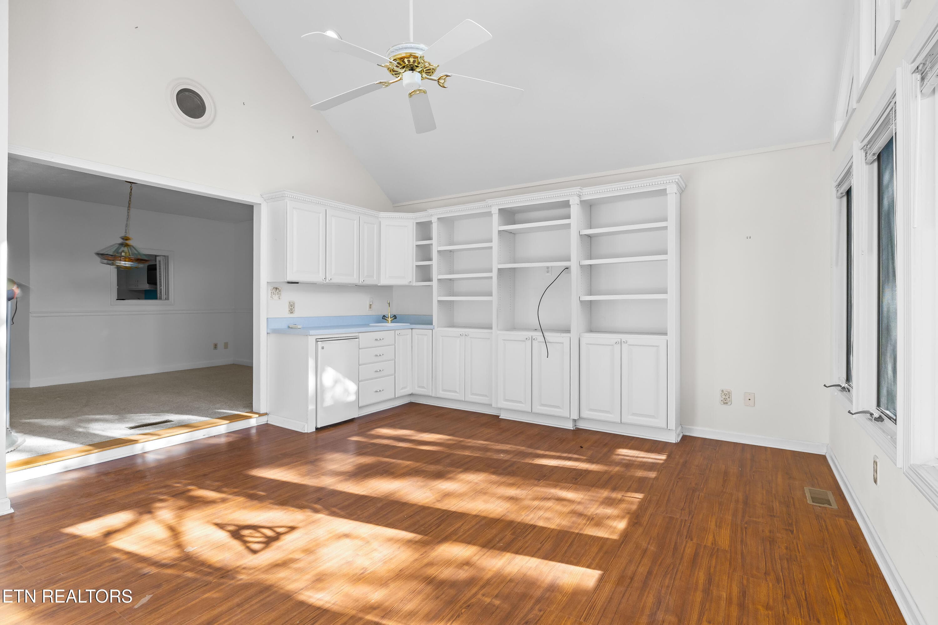Main level Sunroom with shelving - 905 Glennshire Drive, Knoxville, TN 37923, Knoxville