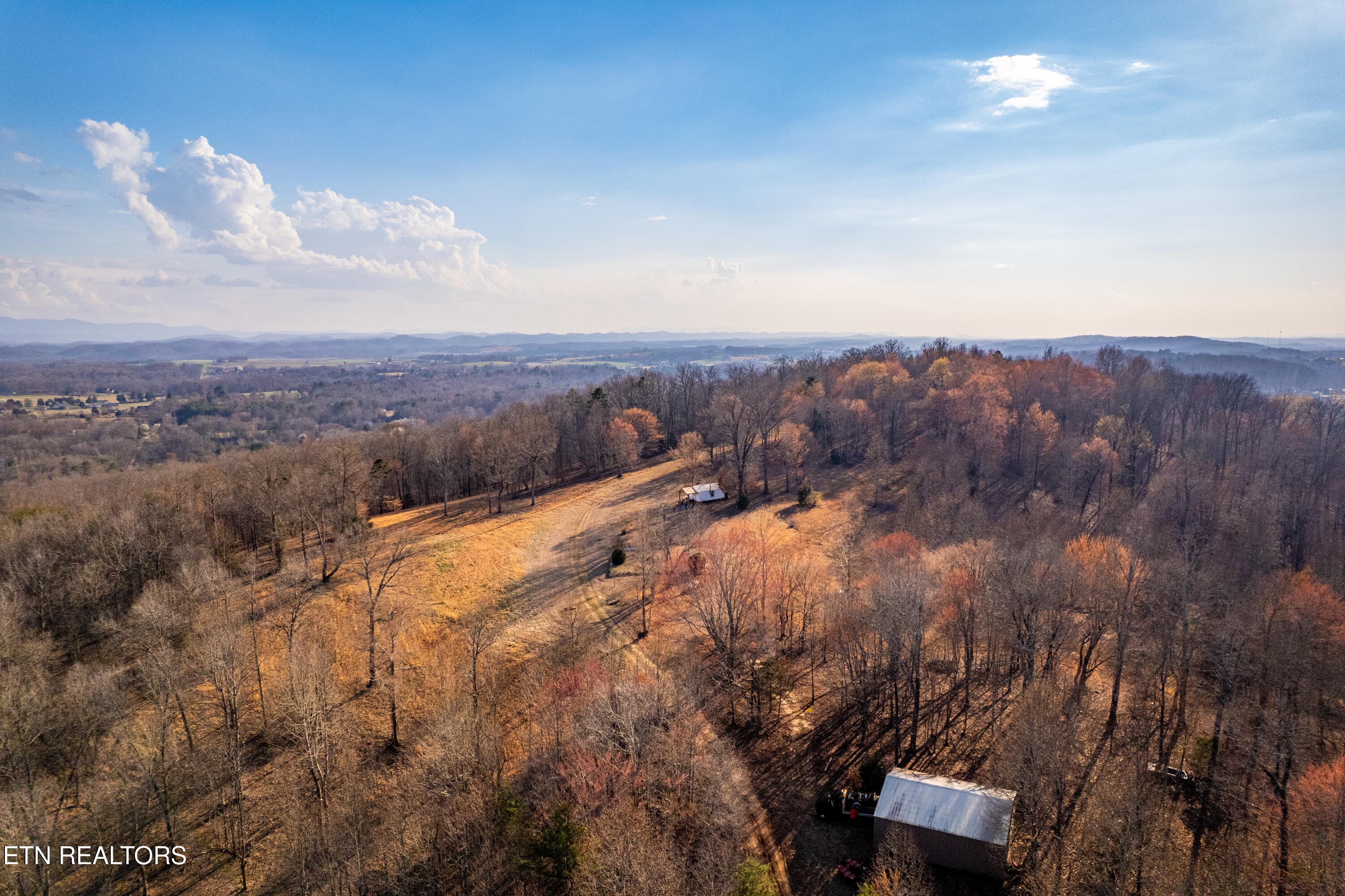 Drone of barn and cabin - 132 Badger Rd, Madisonville, TN 37354