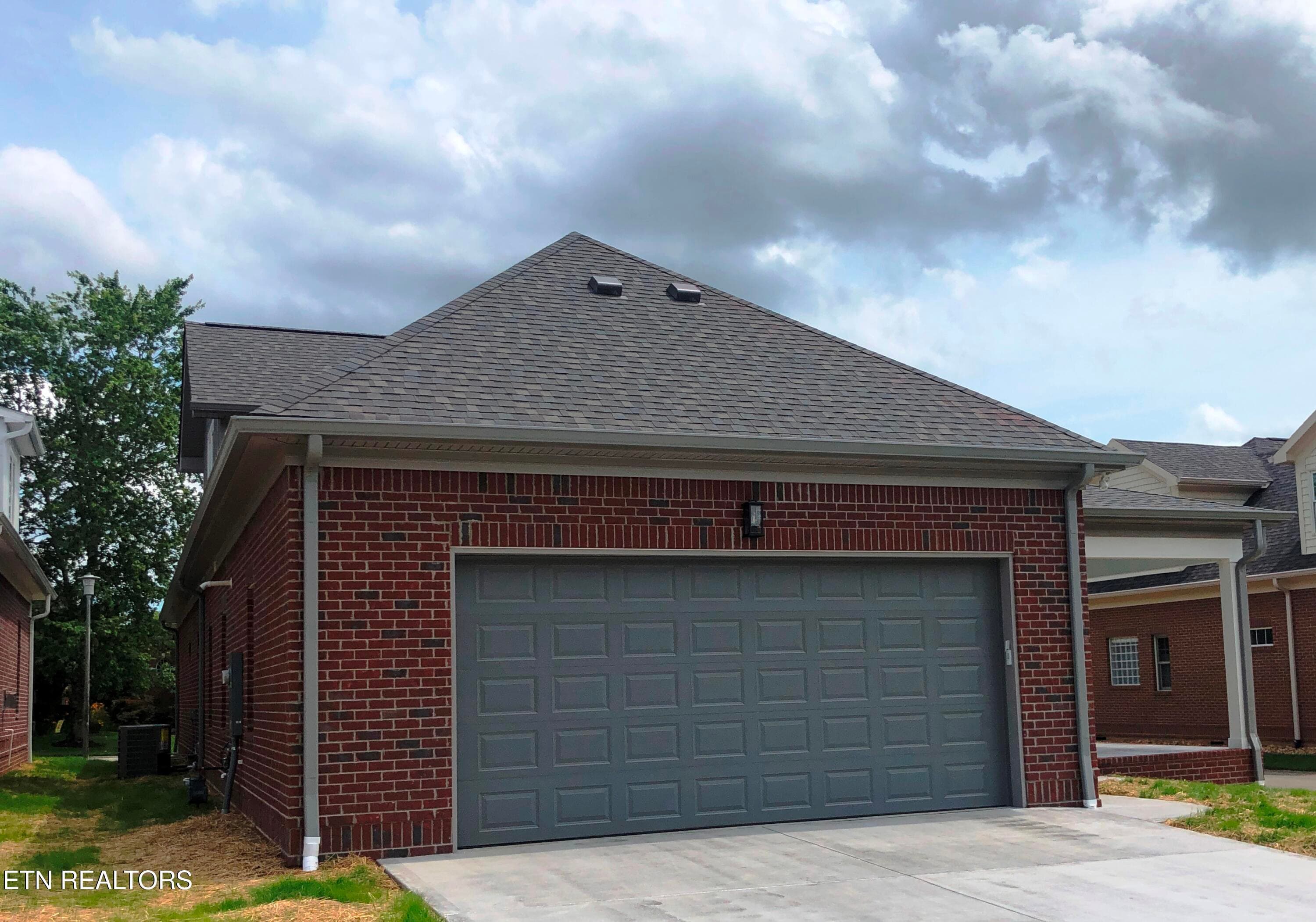 Large 18 ft x 8 ft Garage Door - 85 Royal Troon Circle, Oak Ridge, TN 37830