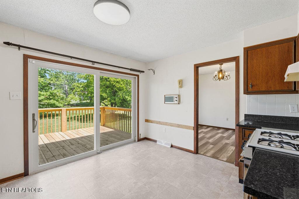 Kitchen with access to the back deck - 4309 Hicken Rd, Knoxville, TN 37938