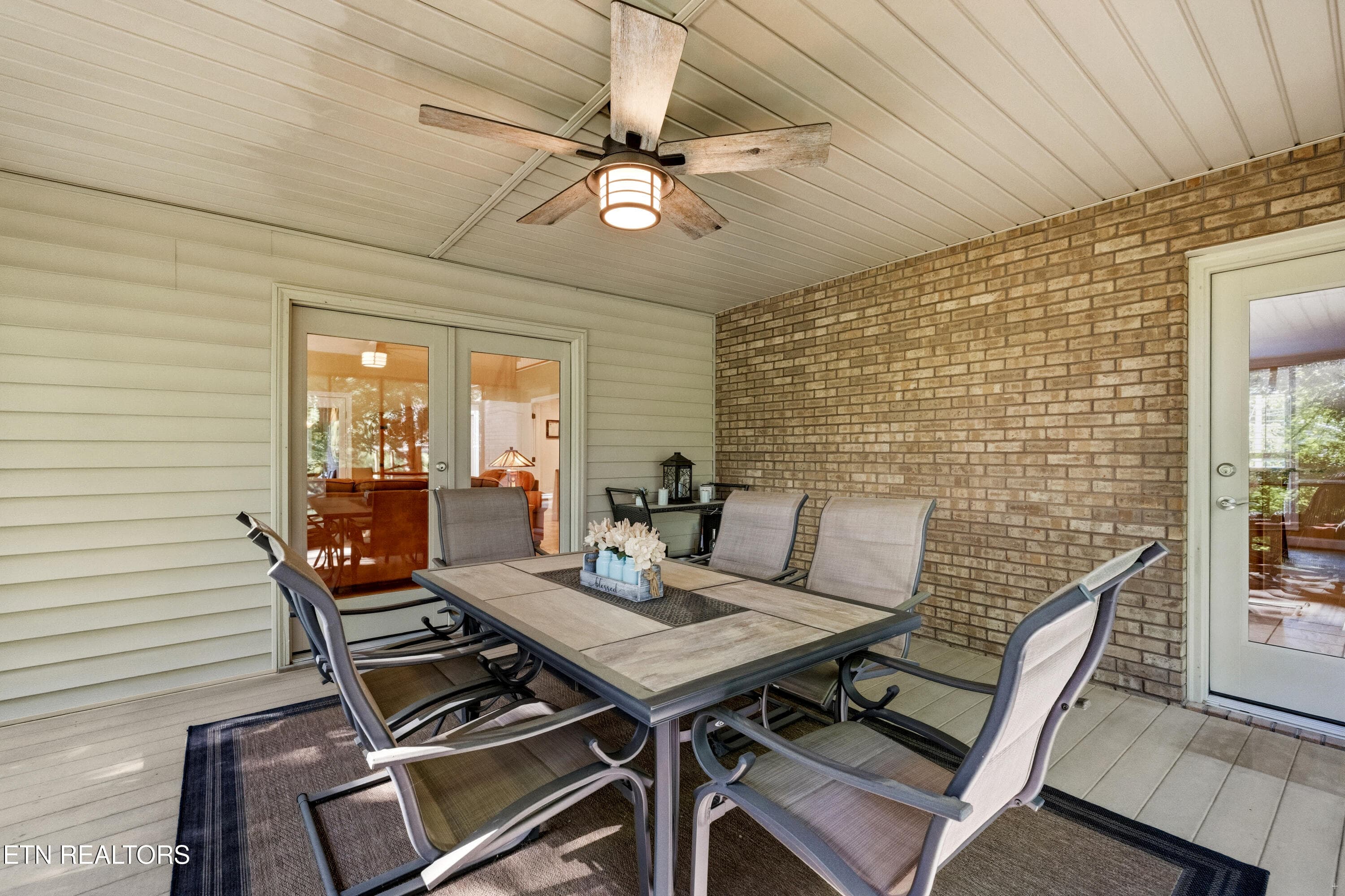 Doors to living areas off porch - 127 Ridgeland Lane, Sharps Chapel, TN 37866