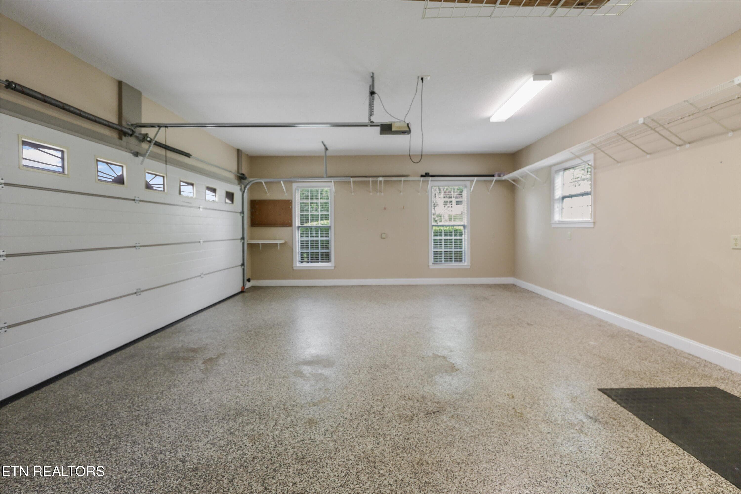 Oversized 2 car garage with epoxy floor - 145 Nunyu Tr, Vonore, TN 37885
