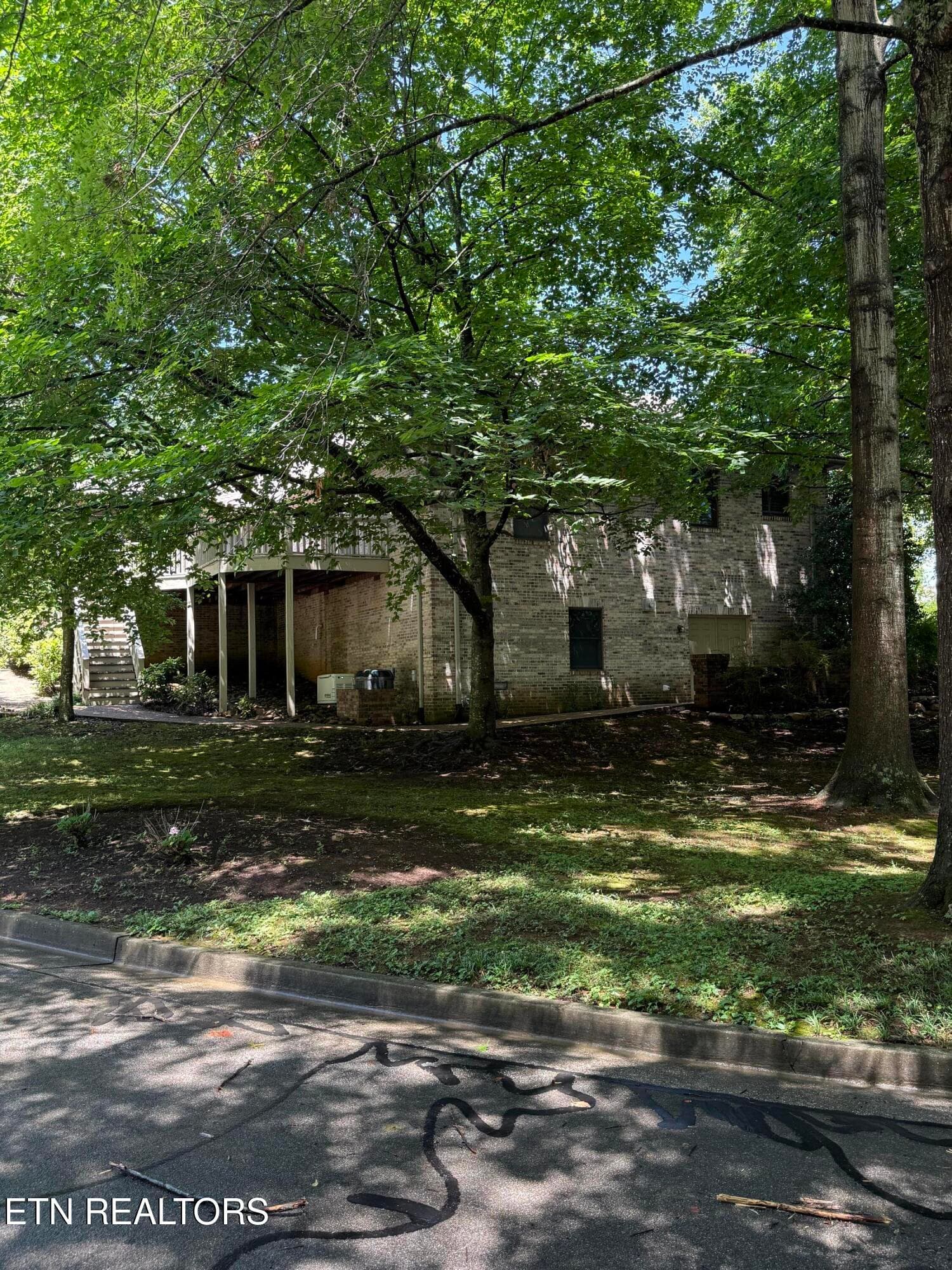 back/side with decking - 1817 Peppertree Drive, Alcoa, TN 37701