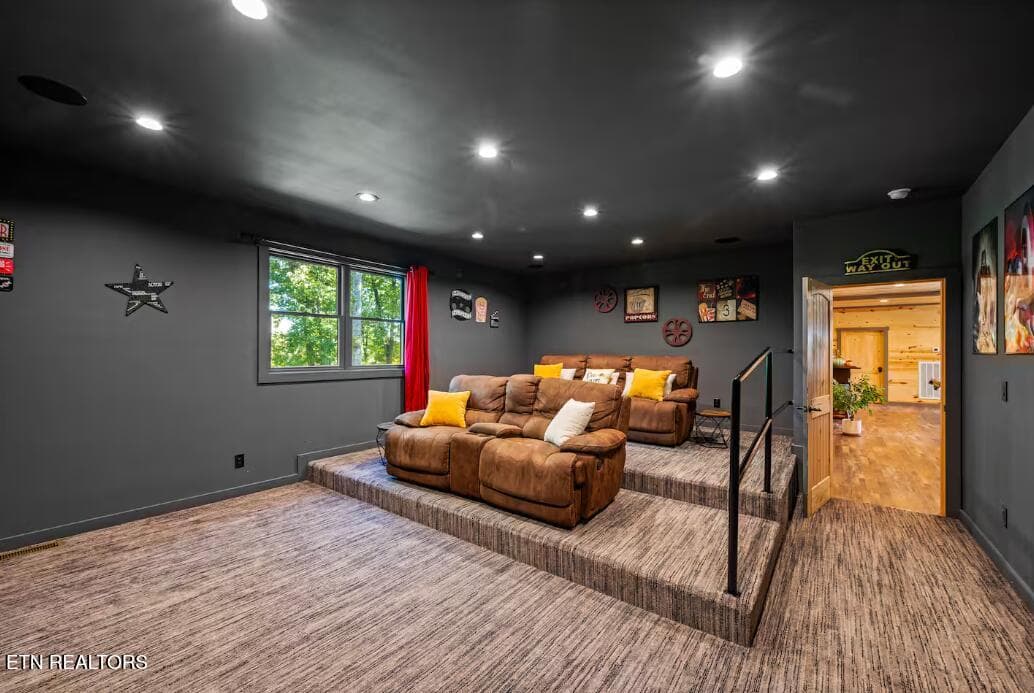 media theater room with elevated seating - 2612 Cloud View Drive, Sevierville, TN 37862, Sevierville