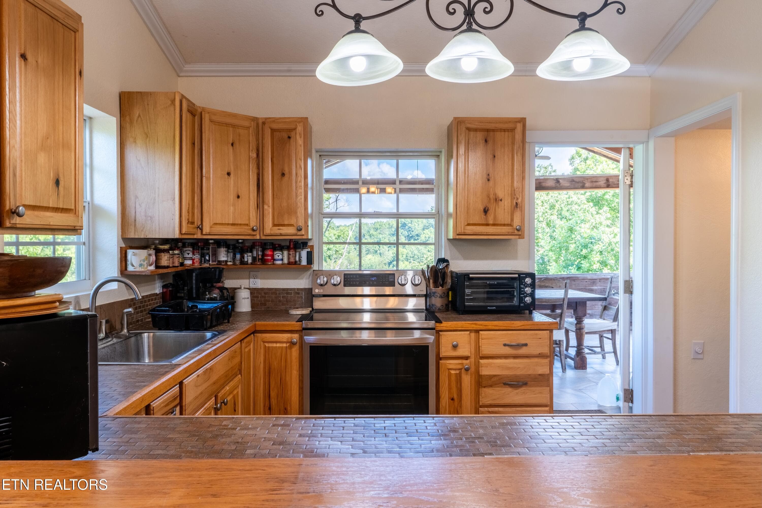 Kitchen and entry to Covered Porch - 1225 Paradise Lane, Dandridge, TN 37725