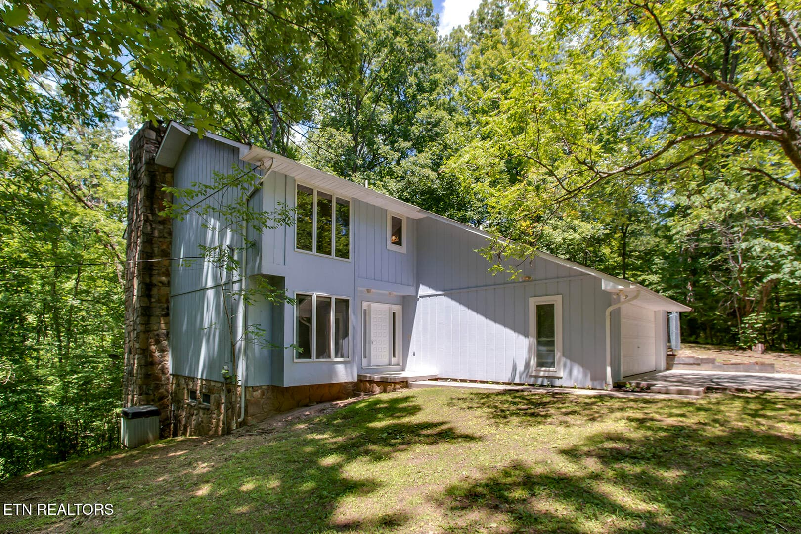 03_BluebirdCoveLane_1560_FrontLeft - 1560 Bluebird Cove Lane, Sevierville, TN 37862