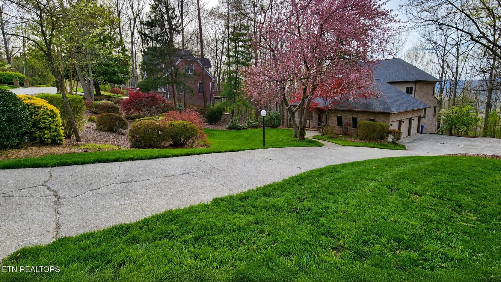 Front of home with cherry Blossom - 152 Whippoorwill Drive, Oak Ridge, TN 37830