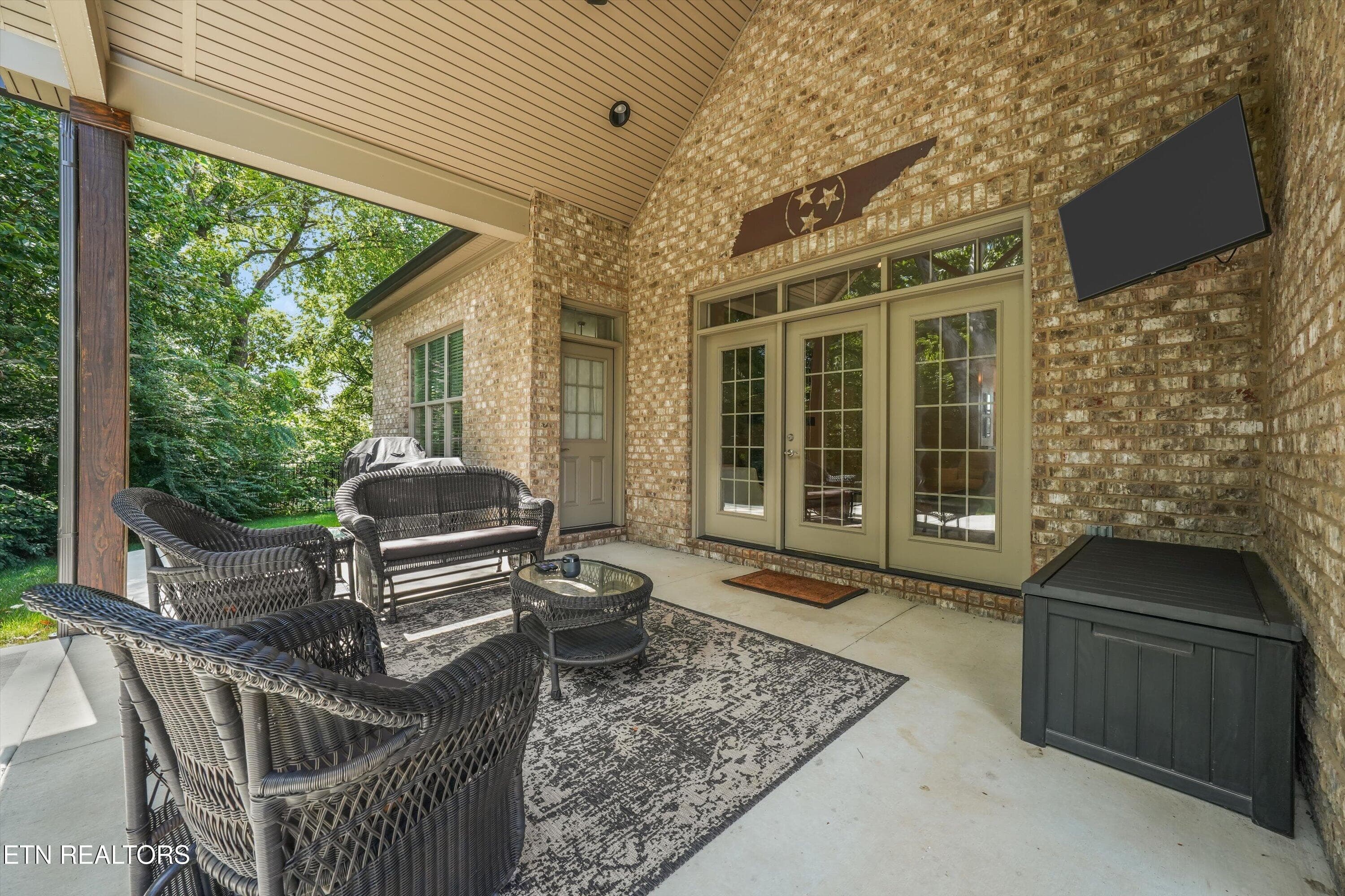 back covered porch - 7703 Madgewood Lane, Knoxville, TN 37909, Knoxville