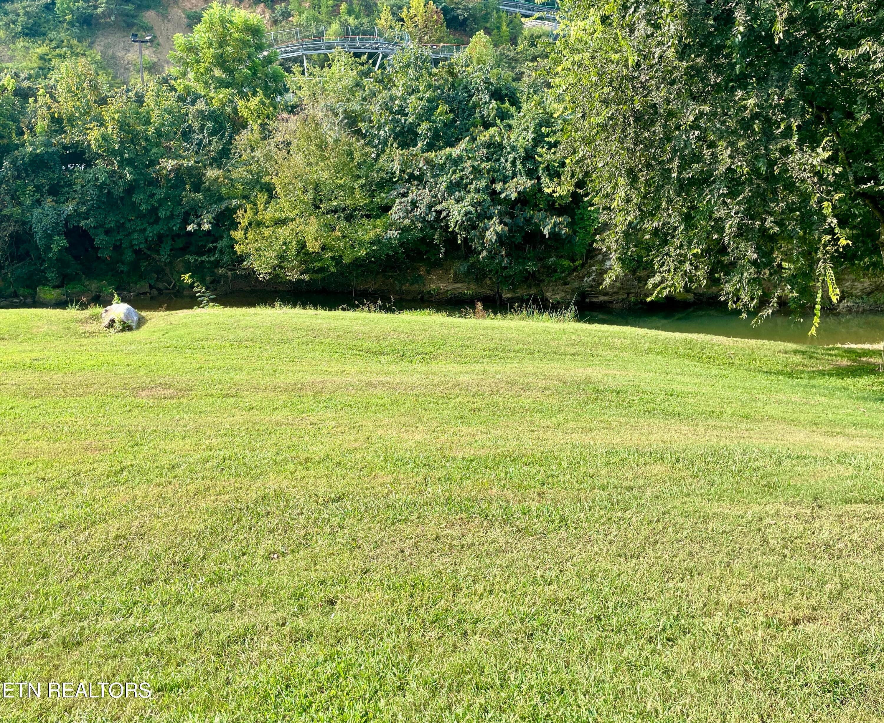 Beach creek view from rear of camper - 3208 Pebblebrook Way, Pigeon Forge, TN 37863, Pigeon Forge