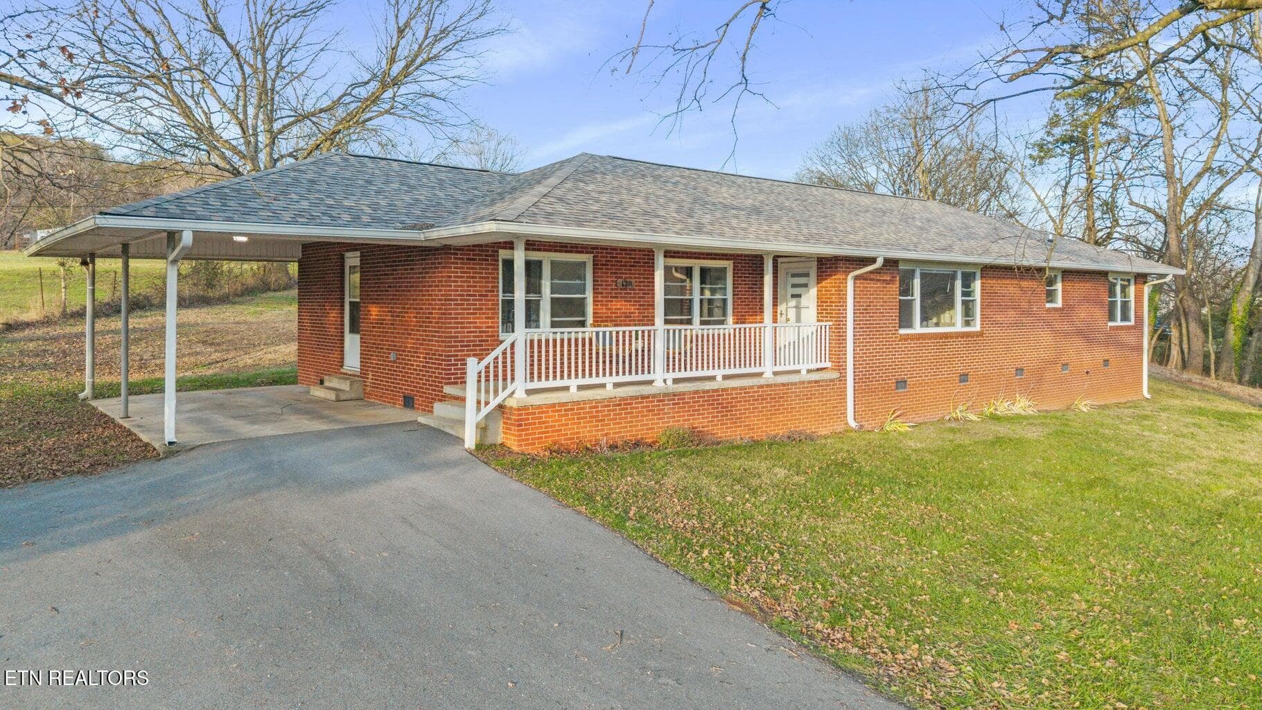 128 Scott St- Front angle - 128 NE Scott St, Charleston, TN 37310