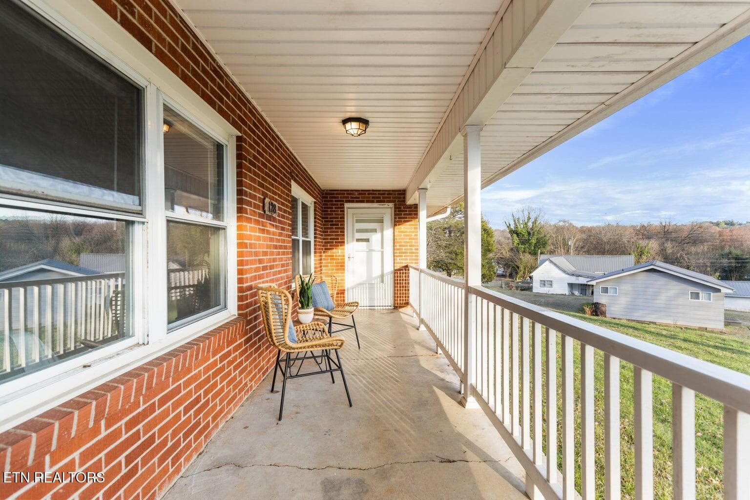 128 Scott St-Porch - 128 NE Scott St, Charleston, TN 37310