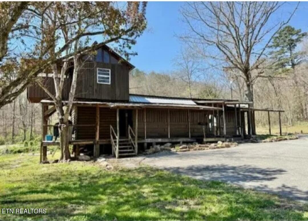 Screenshot_20260915_151325_Gallery - 1941 Bluff Mountain Rd, Sevierville, TN 37876, Sevierville