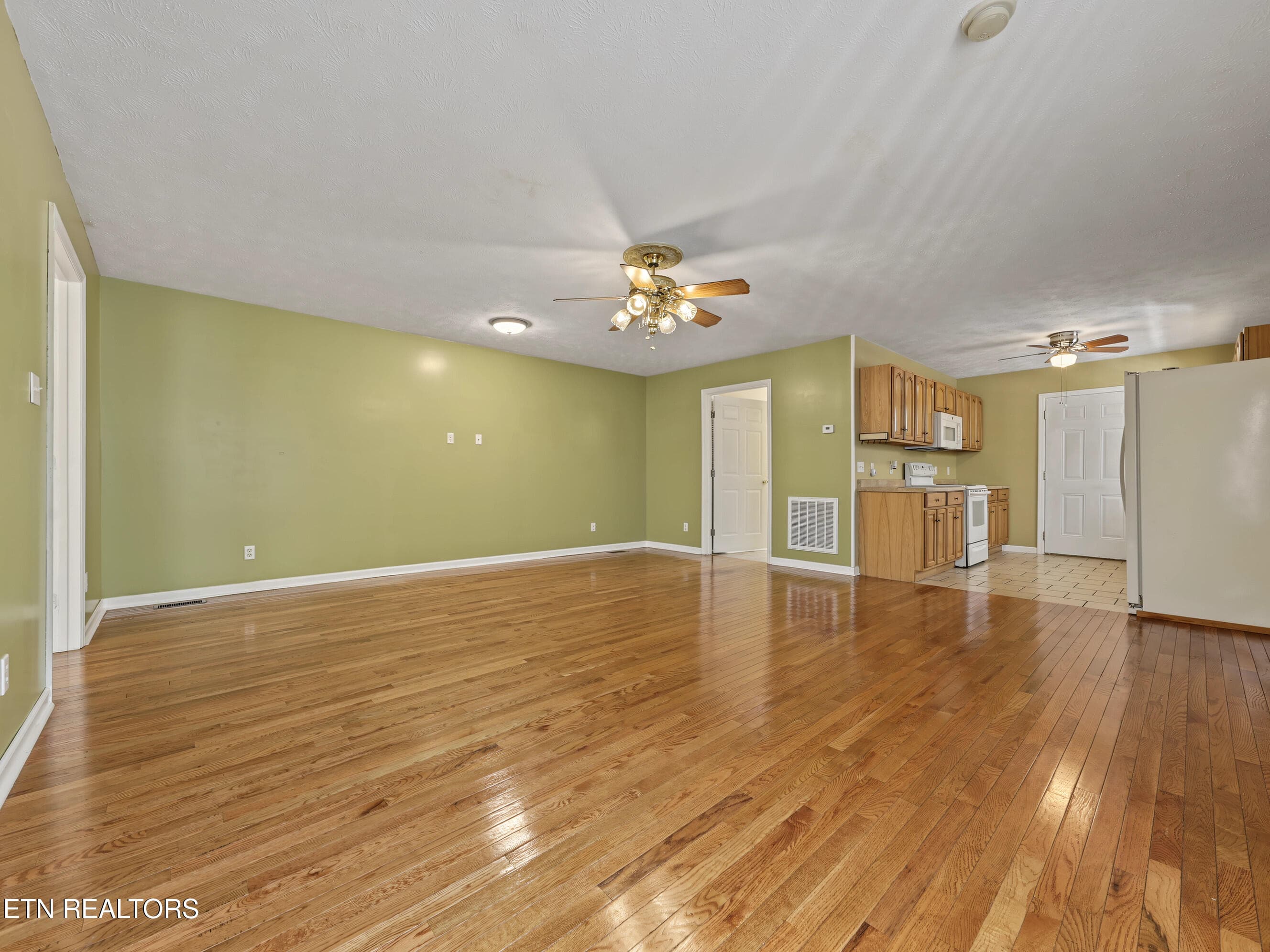 Family room to kitchen - 6060 S Circle Drive, Tallassee, TN 37878, Tallassee