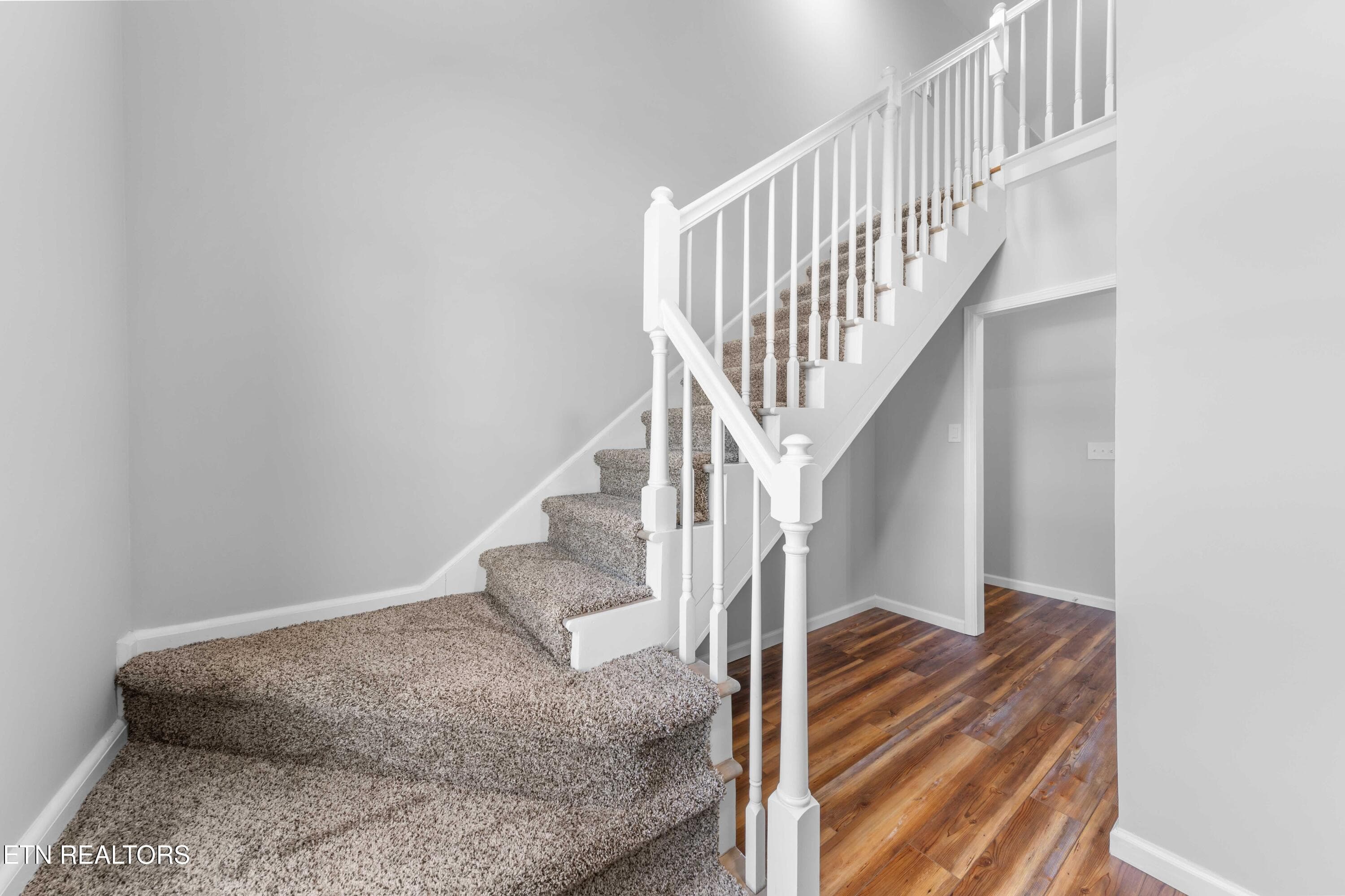 Stairs leading upstiars to Bonus Room - 227 Sugar Maple Court, Madisonville, TN 37354