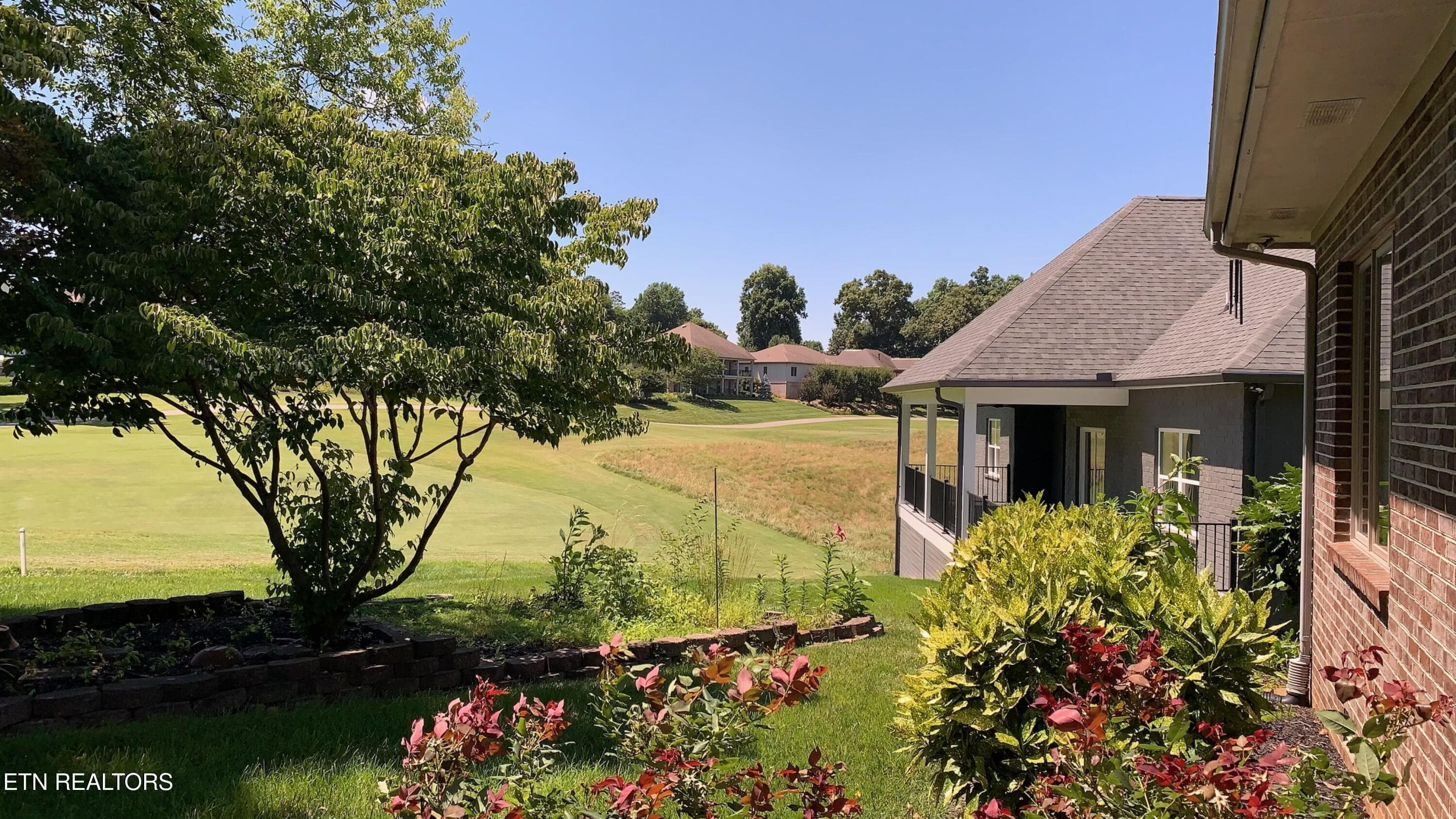rear exterior - 212 Tooweka Lane, Loudon, TN 37774