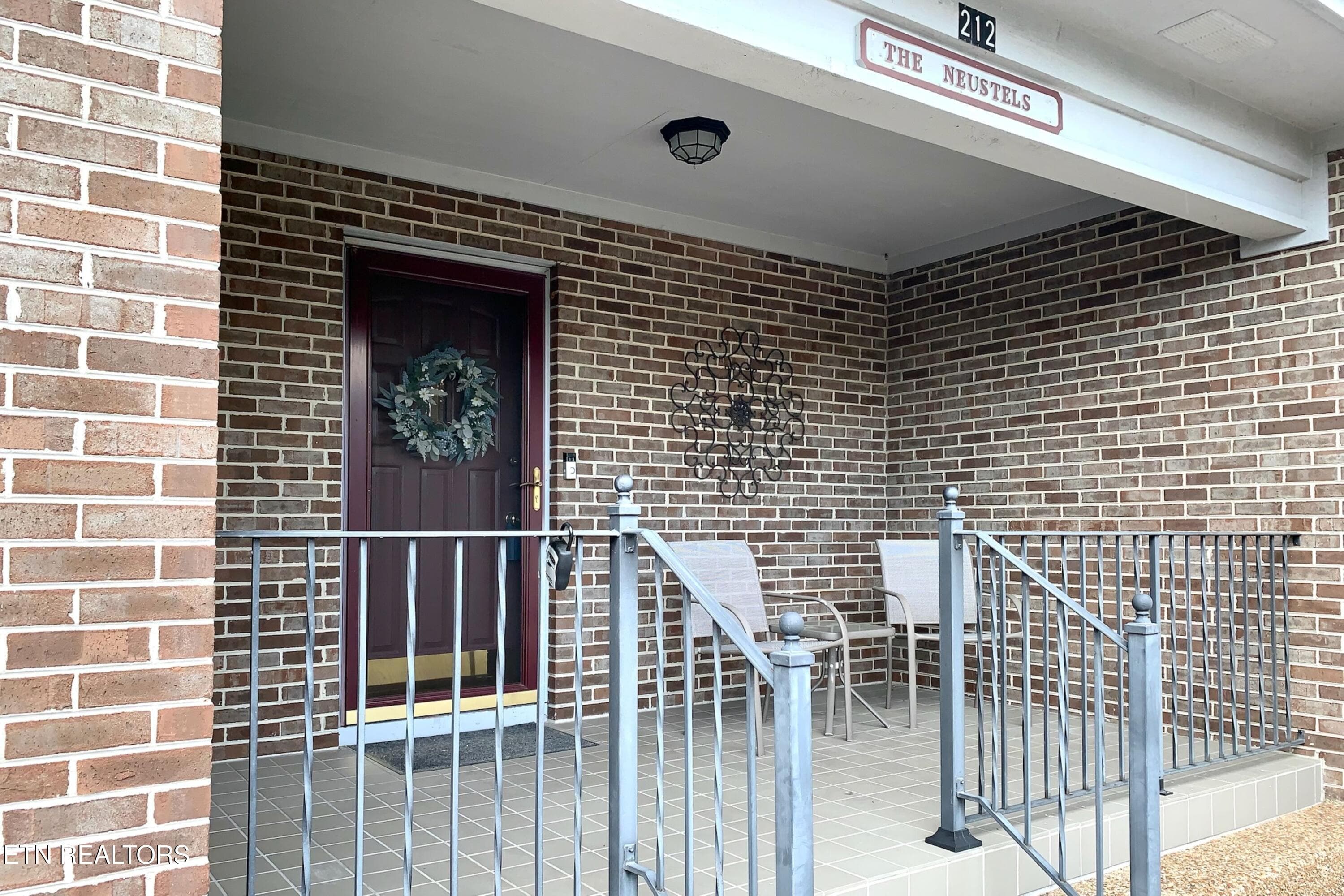 front sitting porch - 212 Tooweka Lane, Loudon, TN 37774