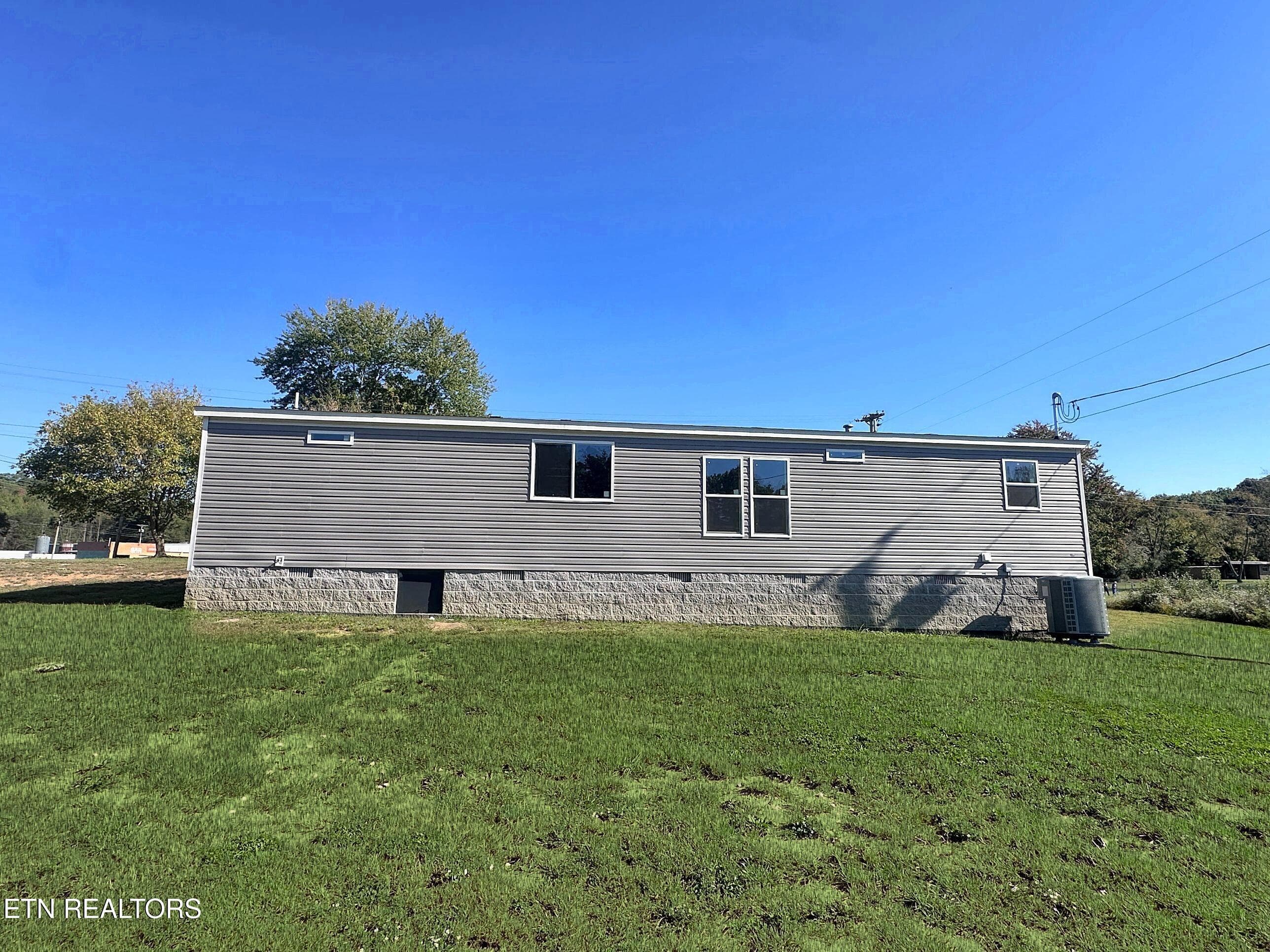 enhanced photo of back - 126 Pullman Lane, Oneida, TN 37841