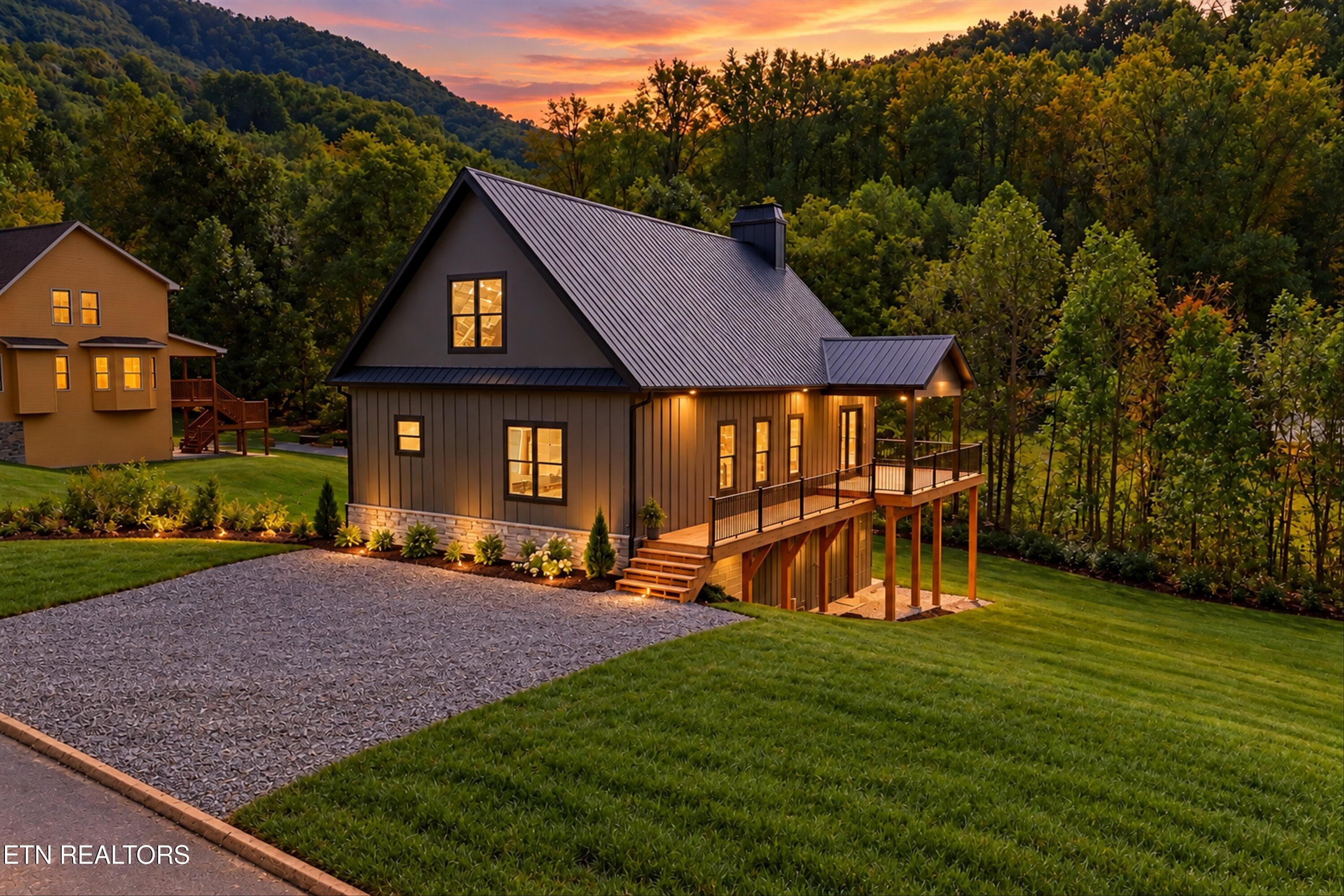Virtually Staged Evening Front Elevation - 3158 Thomas Headrick Rd, Sevierville, TN 37862, Sevierville
