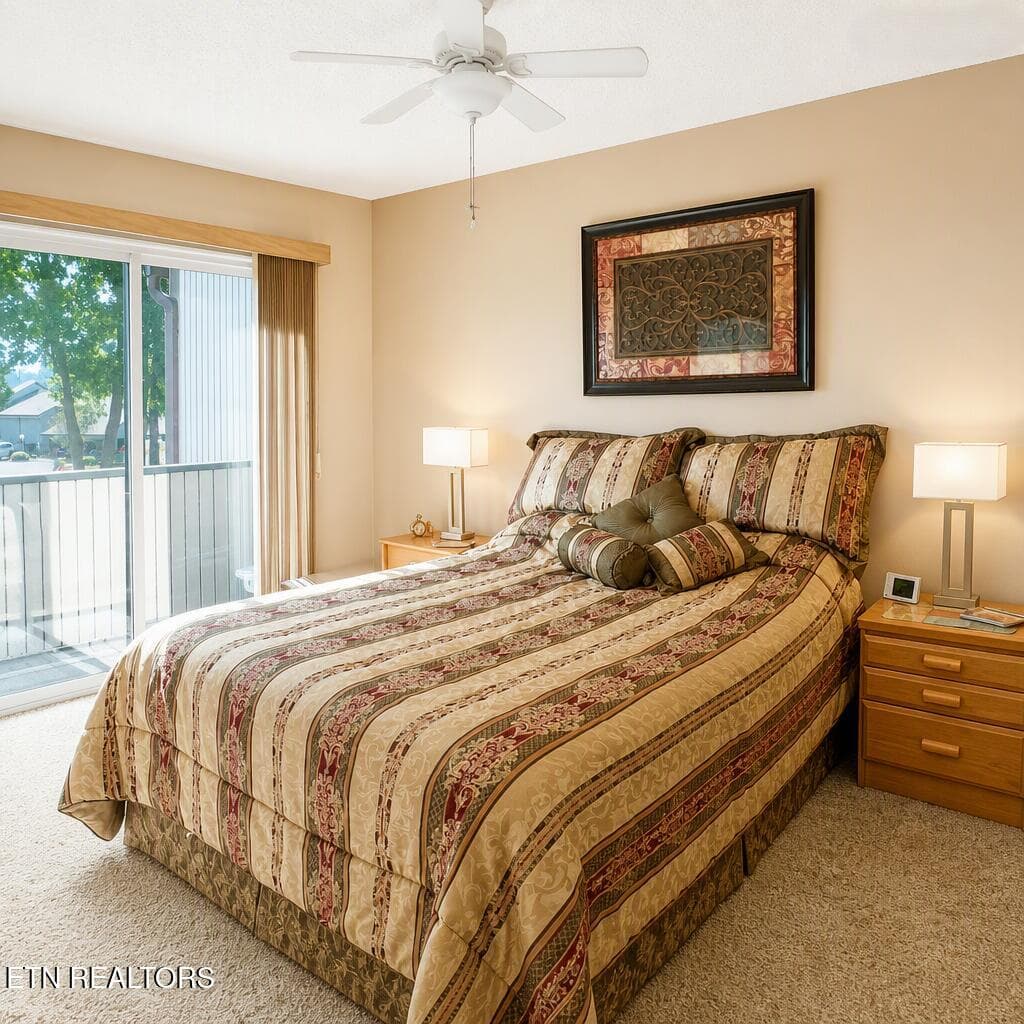 Primary bedroom with access to balcony - 39 Lakeshore Lane 59, Fairfield Glade, TN 38558, Fairfield Glade