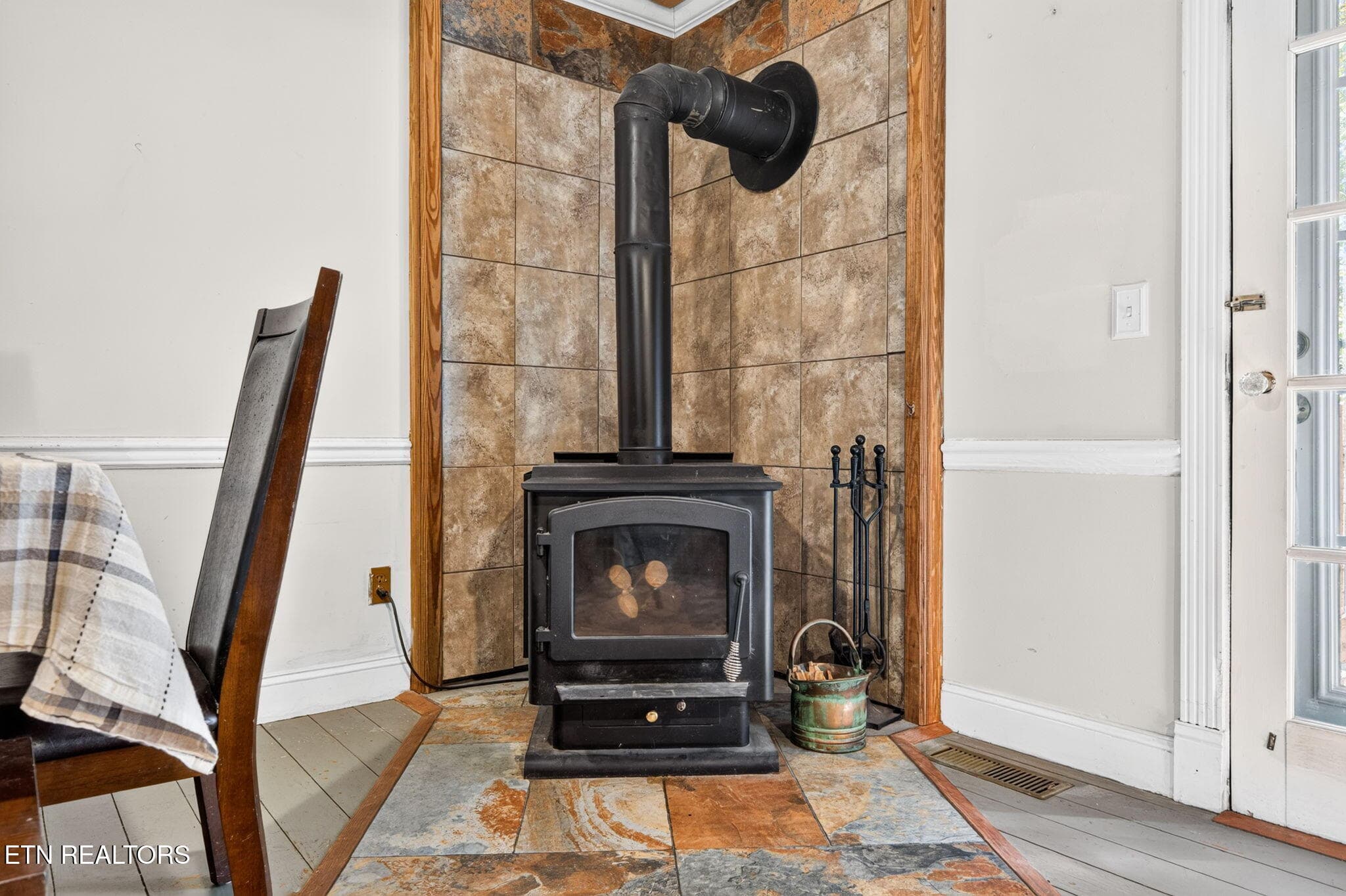 Wood burning stove in dining sitting are - 240 Memory Lane, Monterey, TN 38574