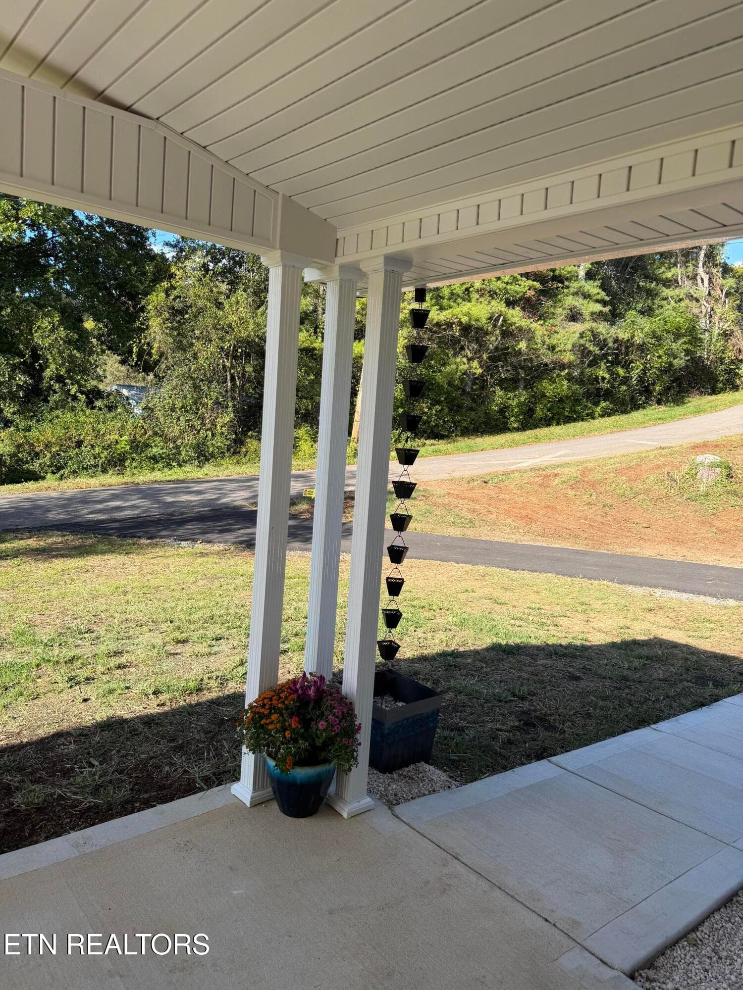 Front porch columns with rain chains - 19185 Martel Rd, Lenoir City, TN 37772, Lenoir City