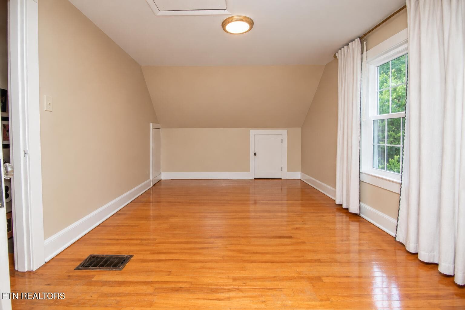 Empty Attic Room with Hardwood Floors - 6809 Nubbin Ridge Drive, Knoxville, TN 37919