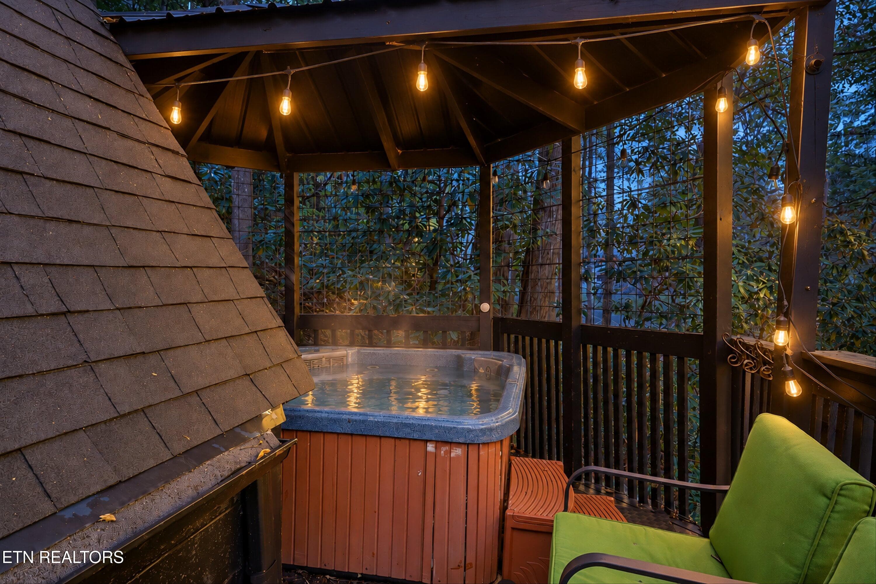 5-12-FINAL-12-hot-tub-uncovered-twilight - 1161 Ski Mountain Rd, Gatlinburg, TN 37738