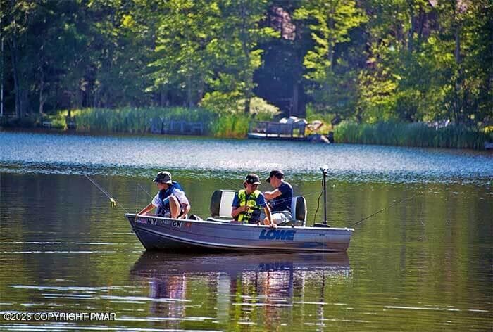 big-bass-lake-men-fishing-from-boat - 270 Packanack Drive, Gouldsboro, PA 18424, Gouldsboro