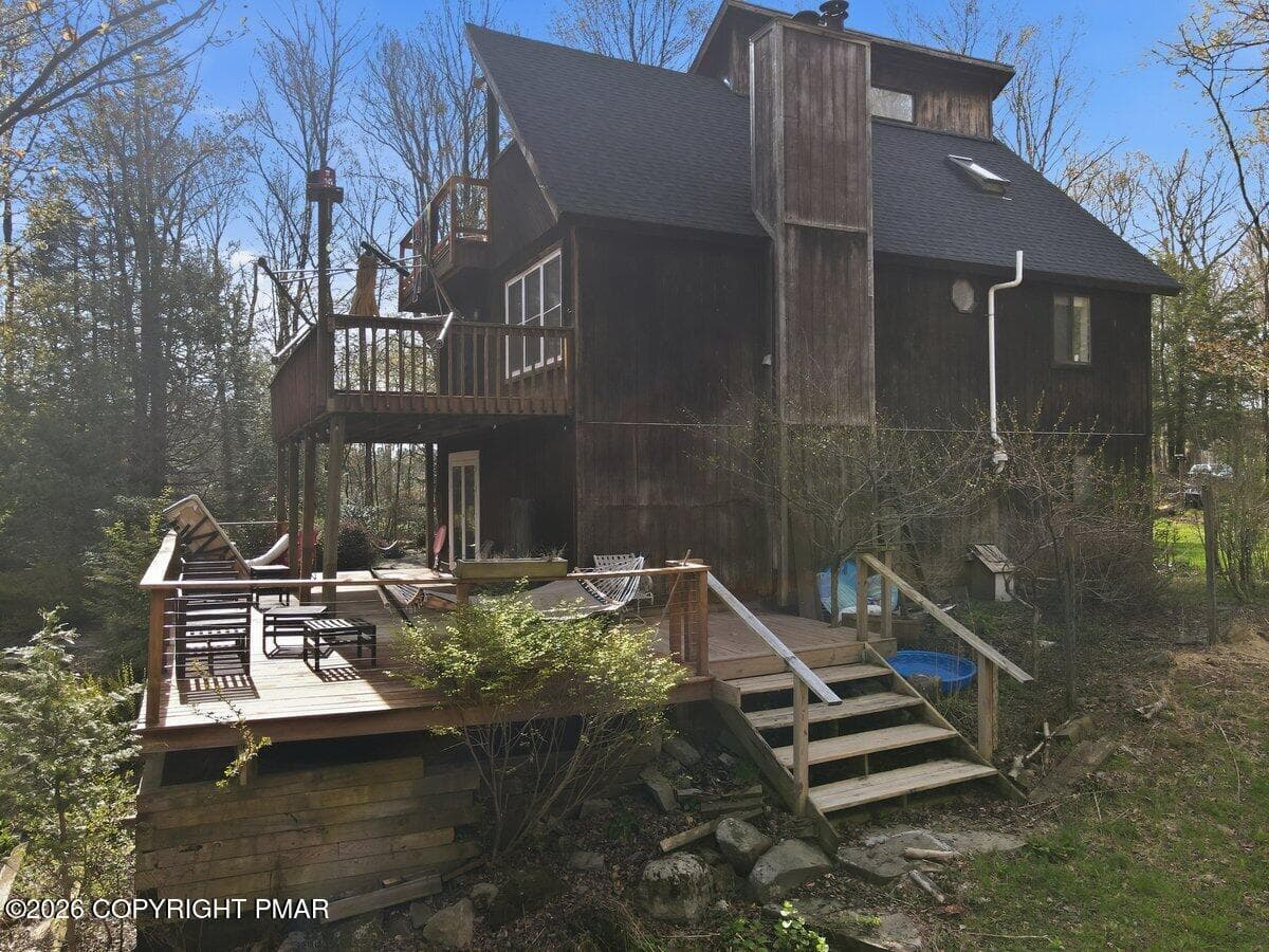 side of the home - 106 Butternut Lane, Canadensis, PA 18325, Canadensis