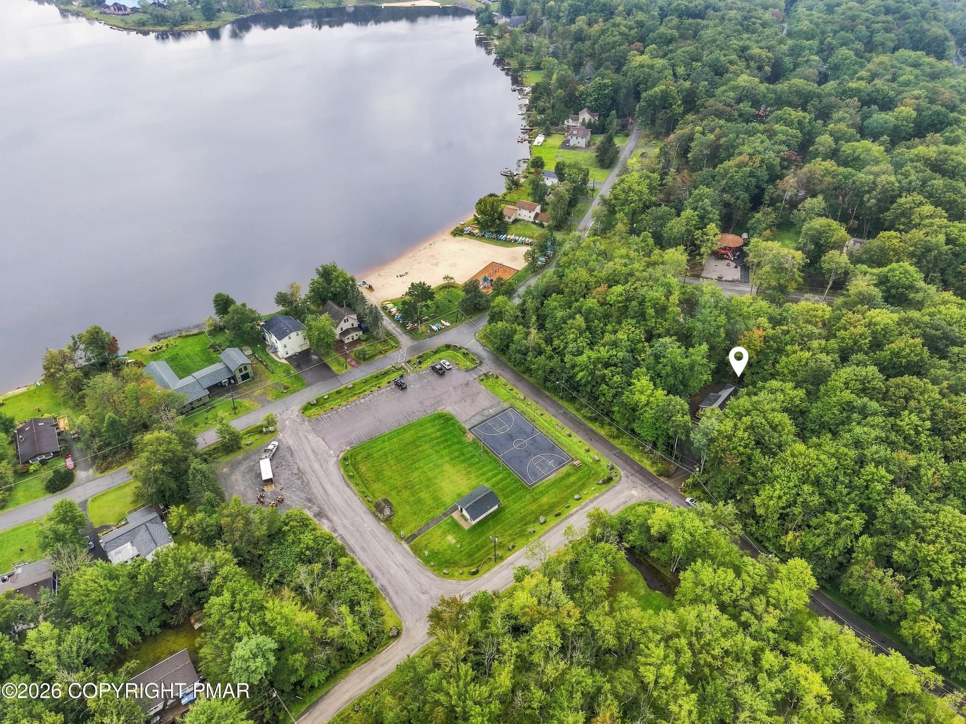 beach less than a block away - 218 Onawa Trail, Pocono Lake, PA 18347