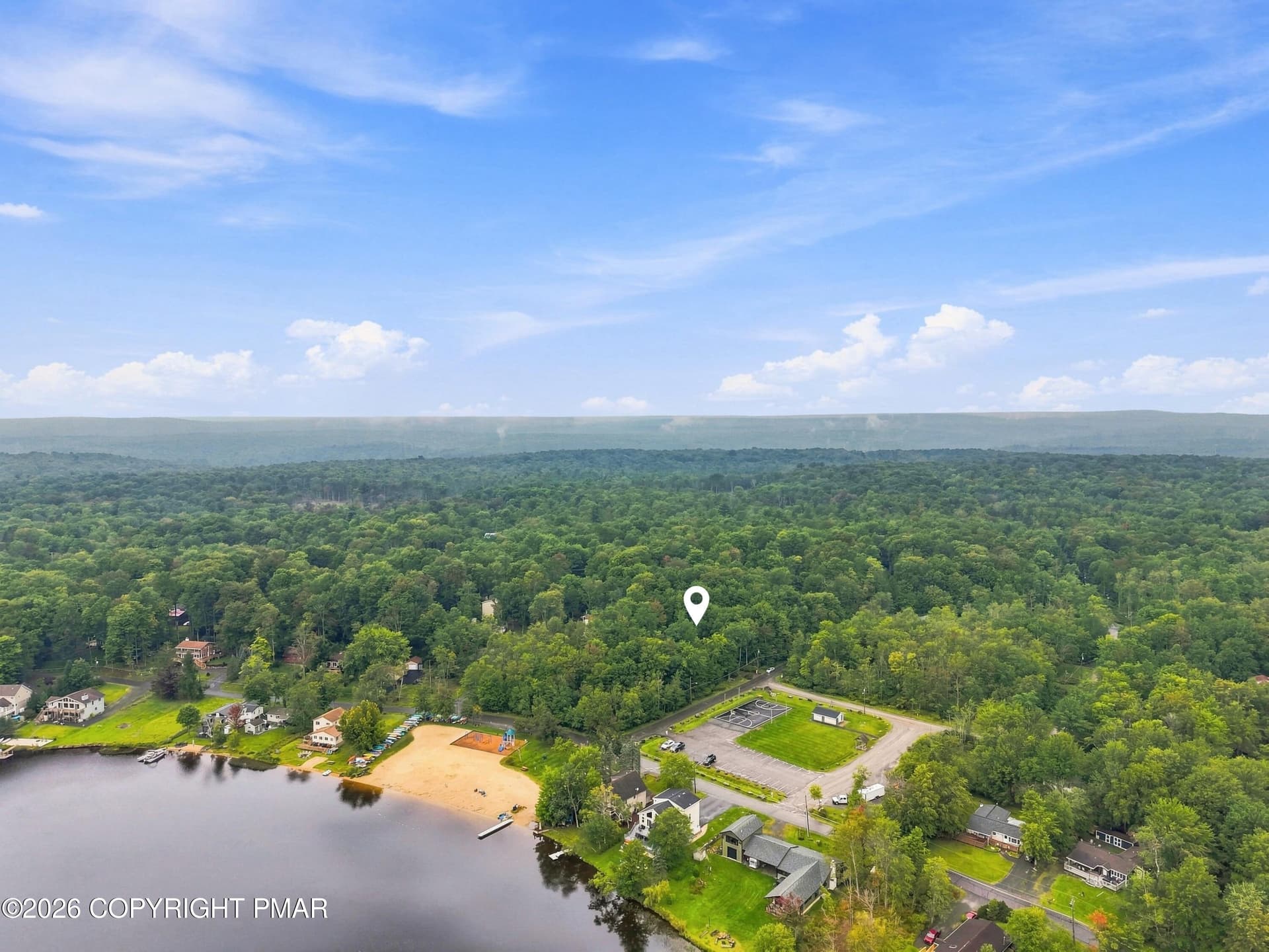 beach less than a block away - 218 Onawa Trail, Pocono Lake, PA 18347