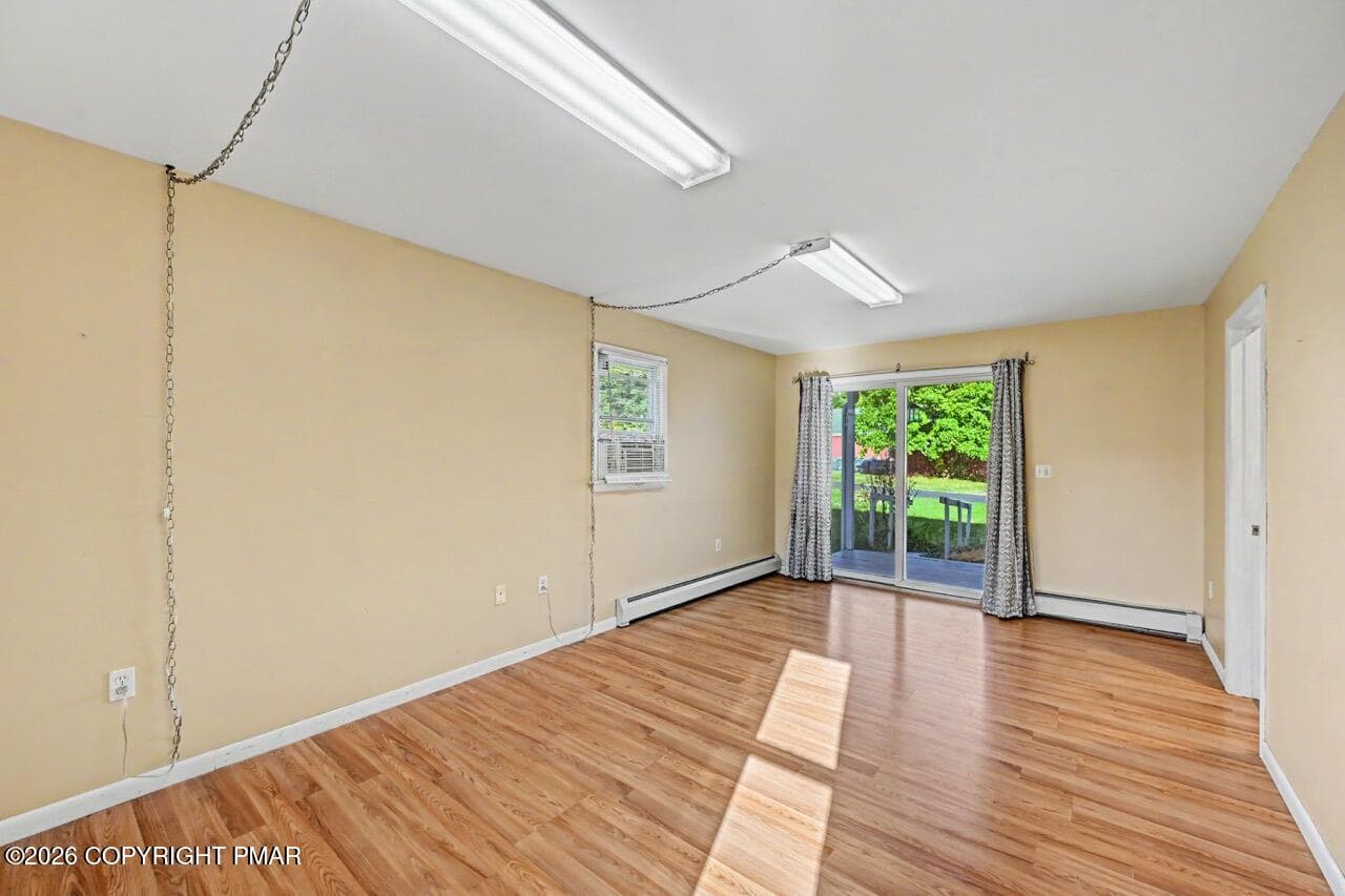 Primary Bedroom w/ Deck & Ramp Access - 2367 Route 209, Sciota, PA 18354, Sciota