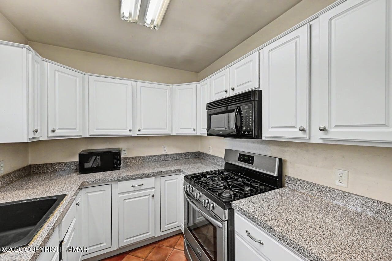 Abundant Cabinetry & Tile Floor - 2367 Route 209, Sciota, PA 18354, Sciota