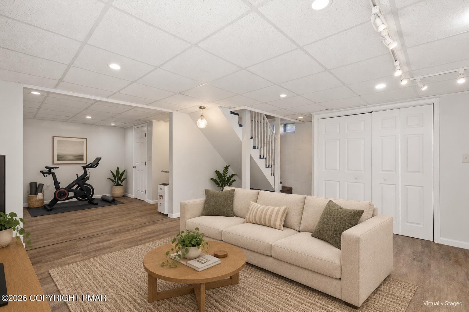 Virtually staged family room and workout - 105 Periwinkle Lane, Stroudsburg, PA 18360, Stroudsburg