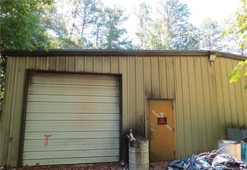Current view side bay door - 30 Lockville Road, Moncure, NC 27559
