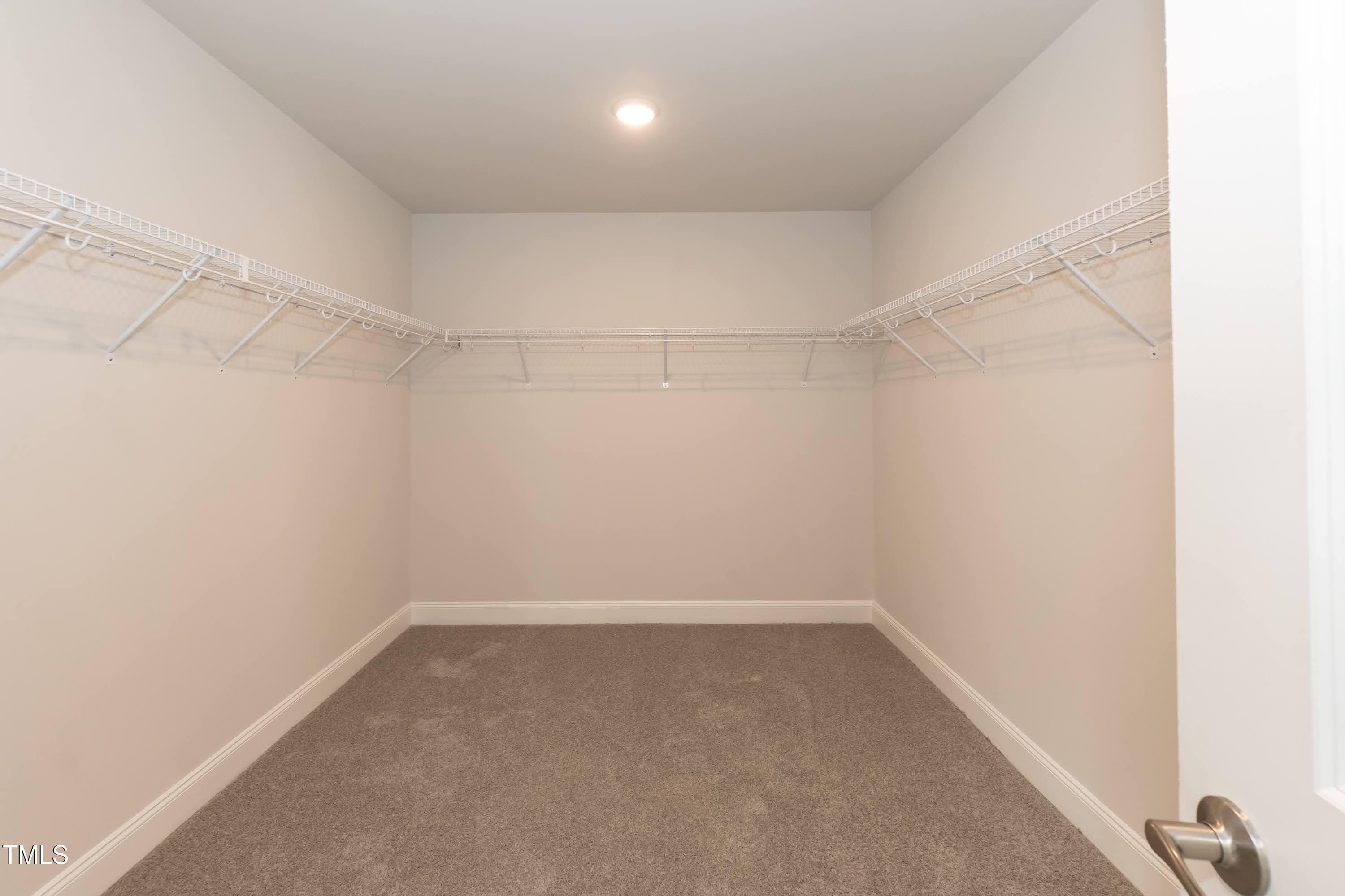 Primary Closet 01 - 243 Lake Edge Drive, Lillington, NC 27546