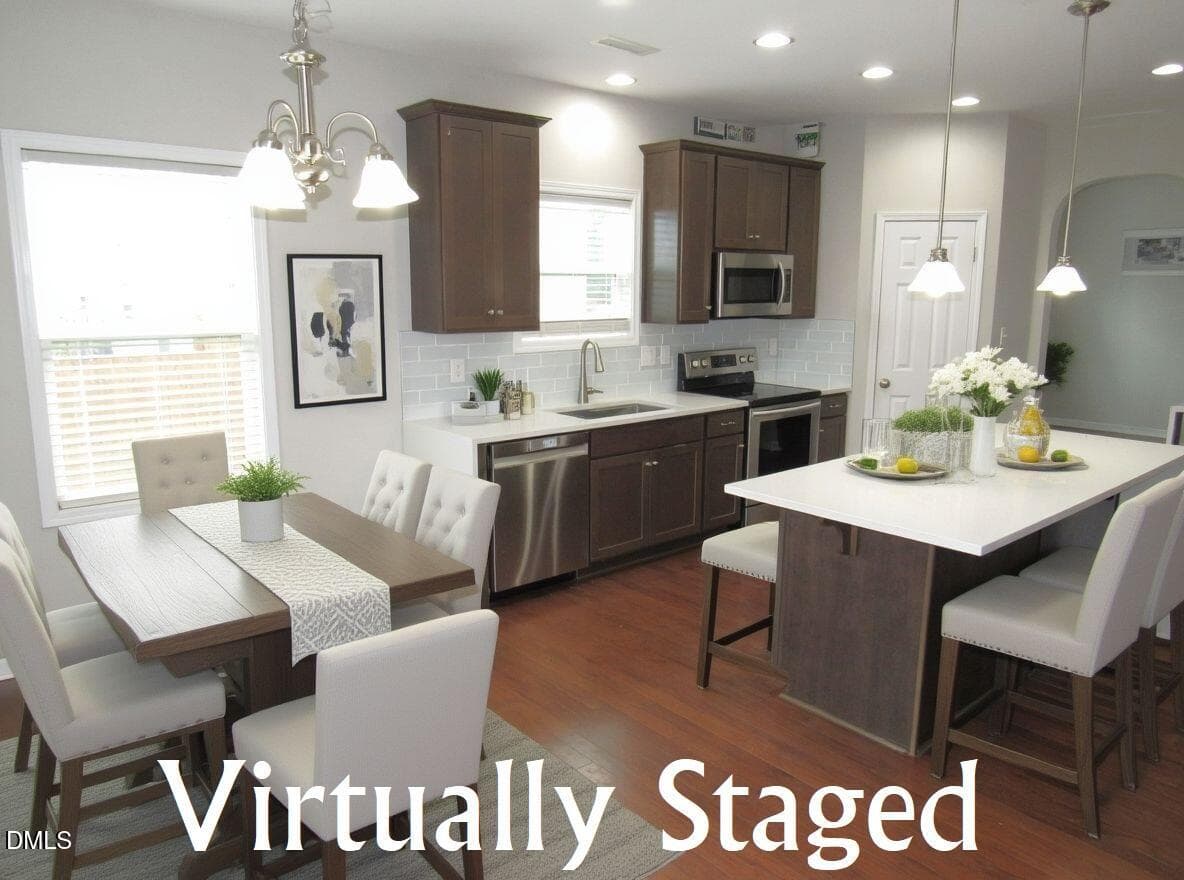 Virtually staged Breakfast area - 124 Richmond Run, Stem, NC 27581