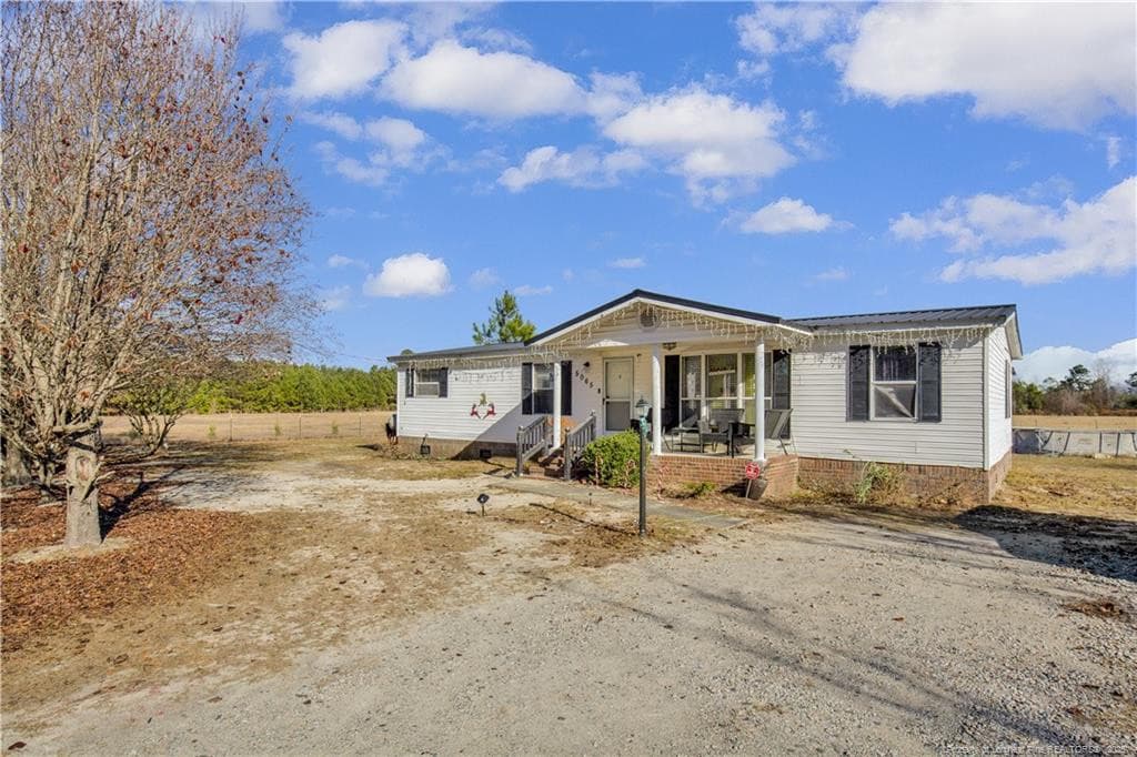Photo 3 - 5065 Tobacco Road, Orrum, NC 28369