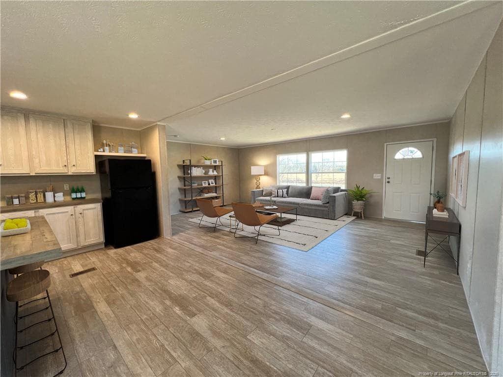 living room with virtual staging - 801 Horseshoe Road, Autryville, NC 28318