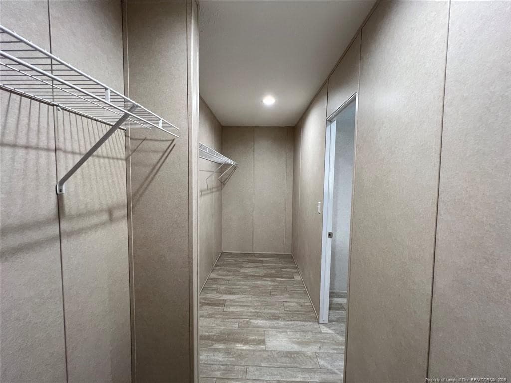 Primary bedroom closet off bathroom - 801 Horseshoe Road, Autryville, NC 28318