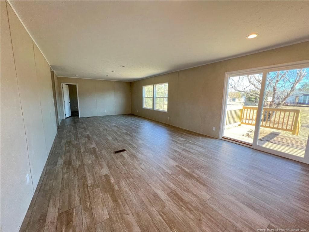 Open Dining Room & Den view from Kitchen - 801 Horseshoe Road, Autryville, NC 28318
