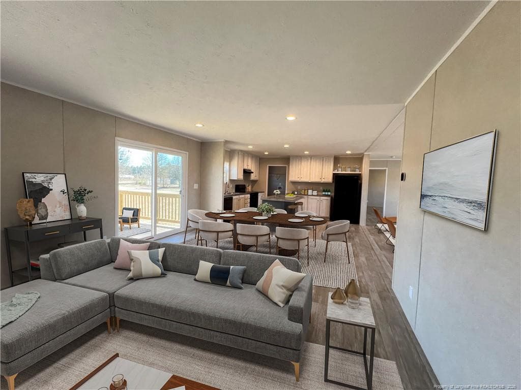 Den & Dining areas with virtual staging - 801 Horseshoe Road, Autryville, NC 28318