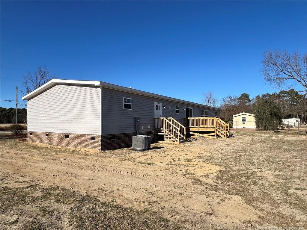 Back view - 801 Horseshoe Road, Autryville, NC 28318