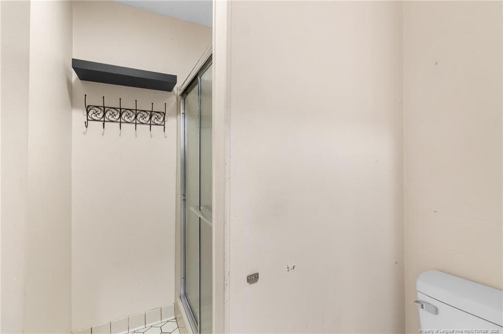 Downstairs primary suite bathroom - 2924 Walden Road, Fayetteville, NC 28303, Fayetteville