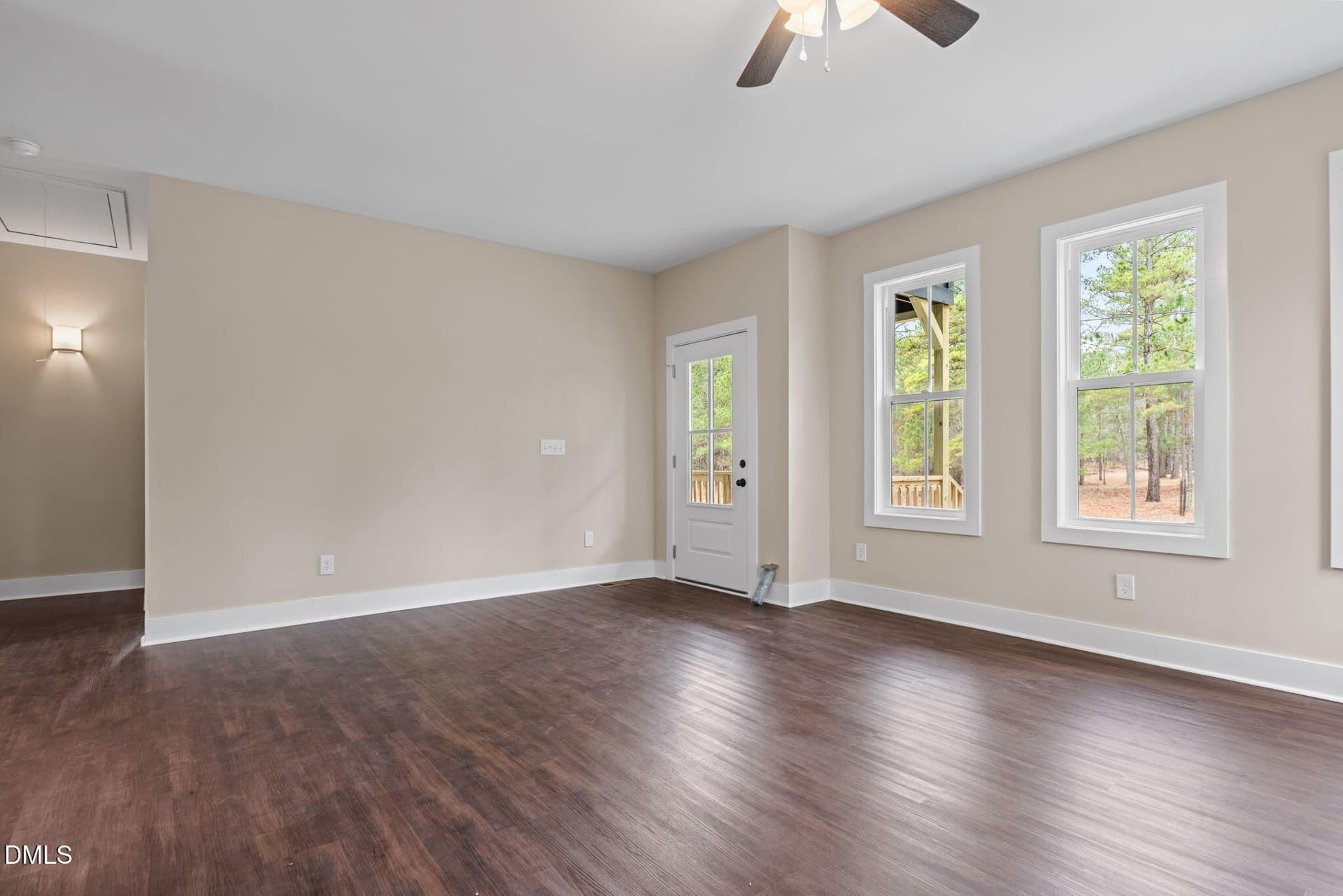 Living Room with Ceiling Fan - 147 Creek Bend Drive, Vass, NC 28394